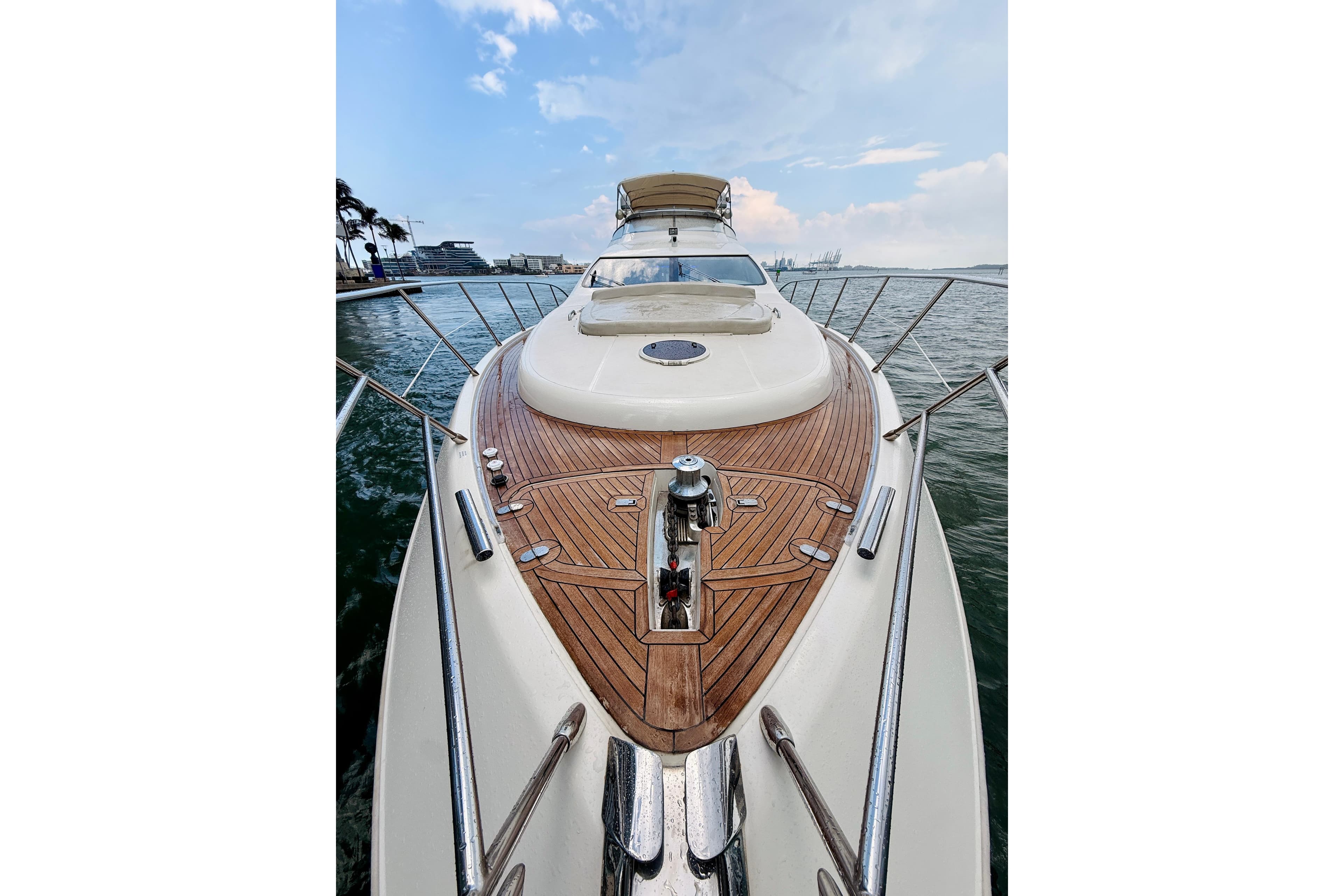 2007 Azimut 68E yacht with sleek deck design on open water.