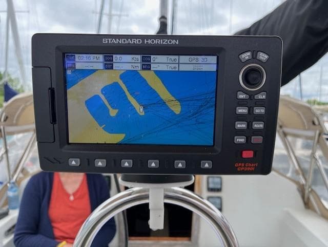 GPS chart plotter on a 1982 C&C 34 sailboat, displaying navigation data.
