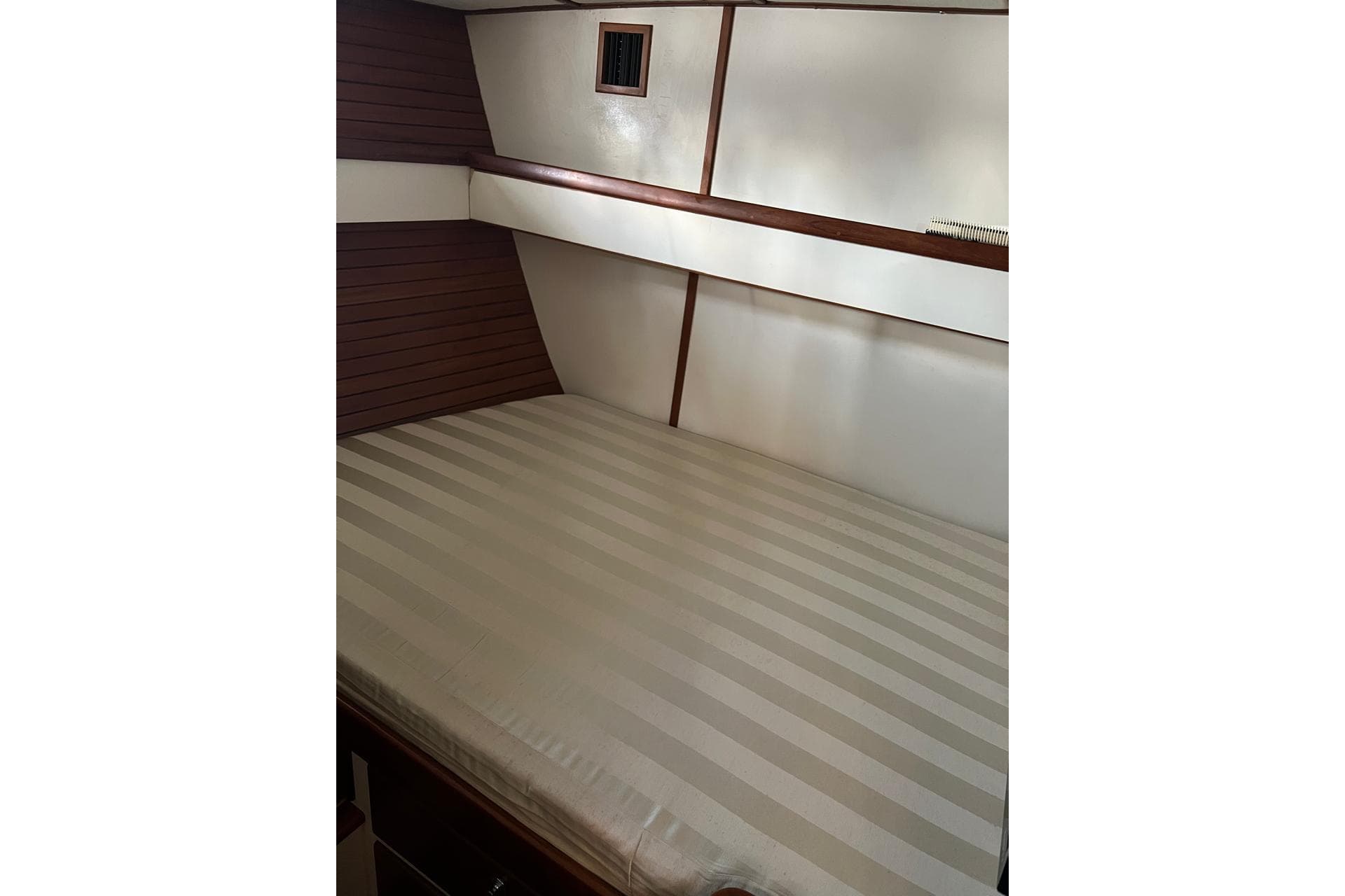 Interior of a 1998 Nordhavn 46 yacht with bed.
