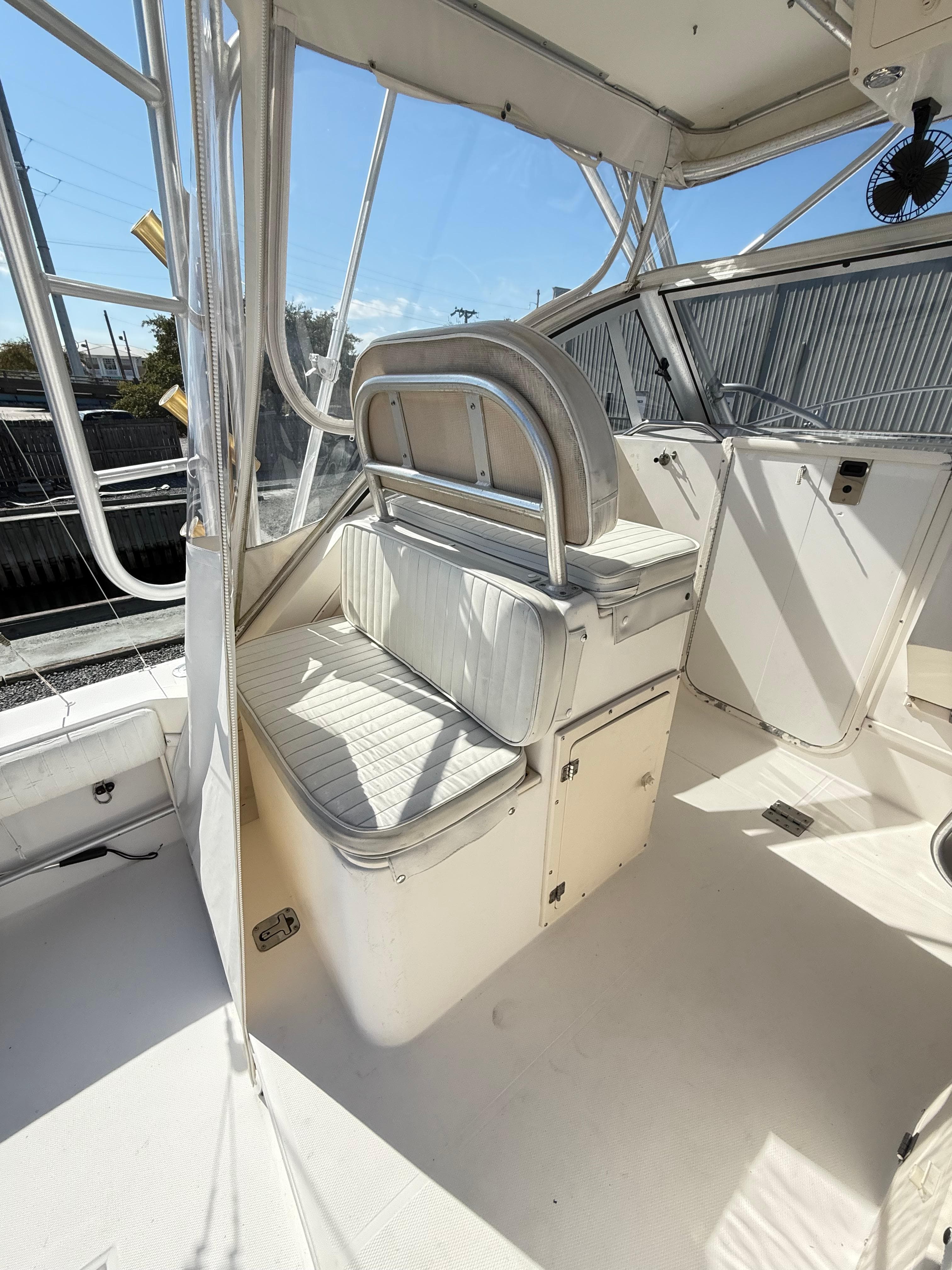 2001 Albemarle 280 Express Sport Fisherman interior with seating and helm area.