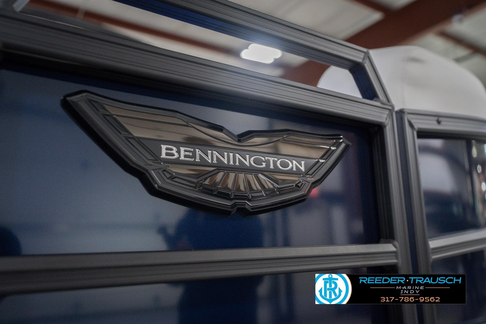 2026 Bennington 24 MCSB boat logo with Reeder-Trausch Marine contact details.
