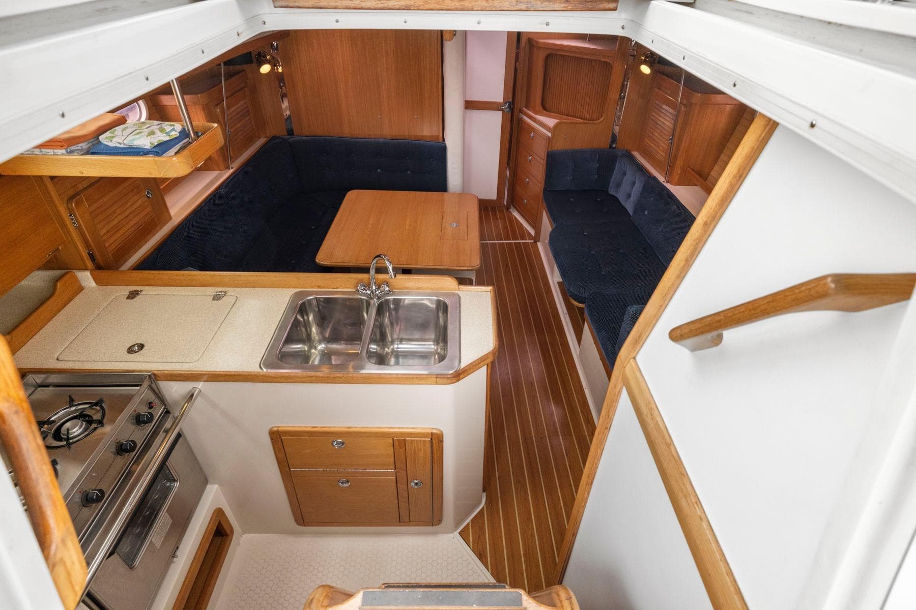 Interior of 2004 Catalina 36 MkII sailboat with kitchen and seating area.