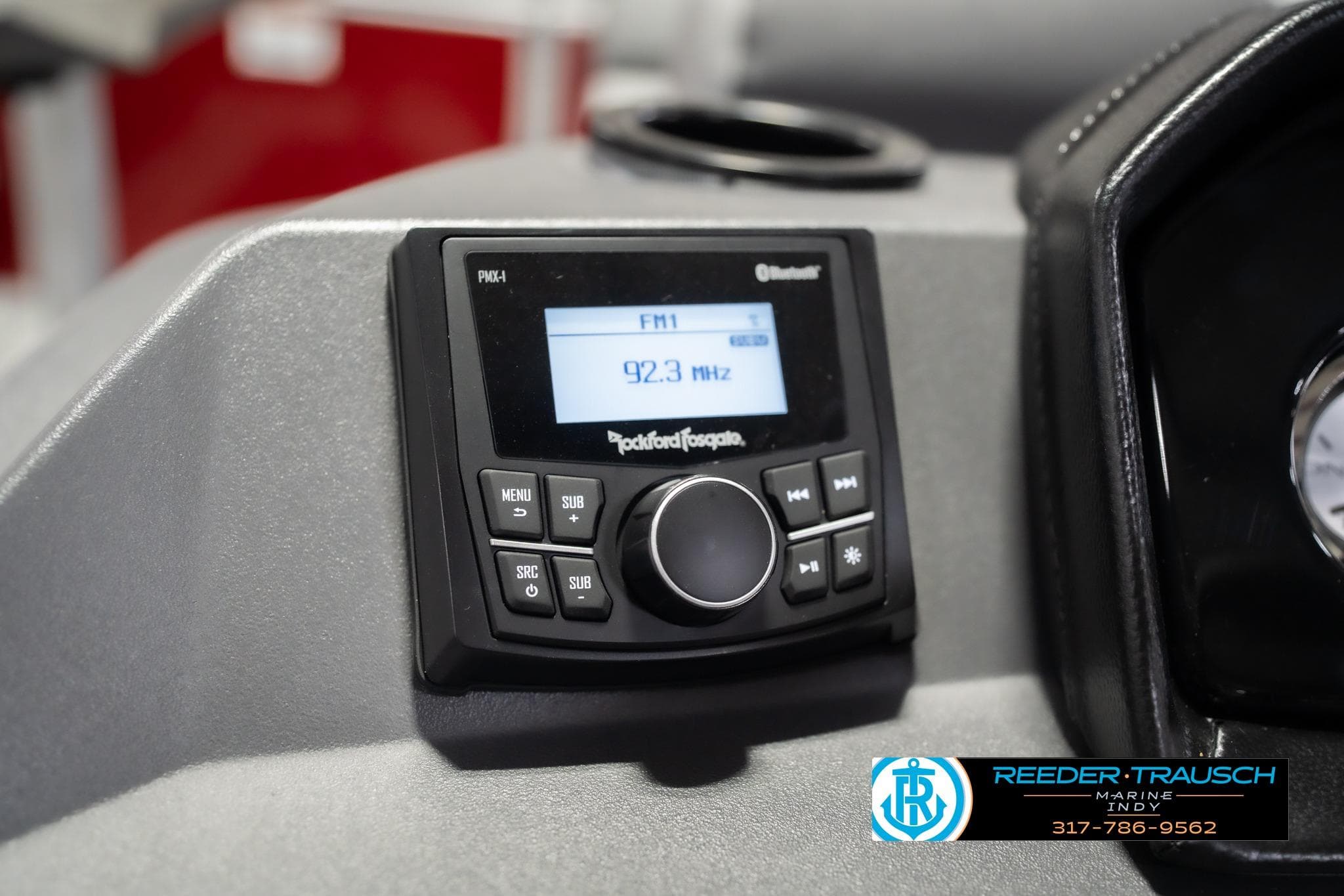 Rockford Fosgate stereo system in 2026 Bennington 20 SSR boat dashboard.