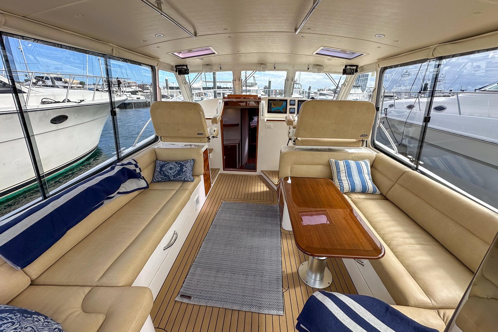 Luxurious interior of 2017 MJM 50z yacht with spacious seating and elegant design.