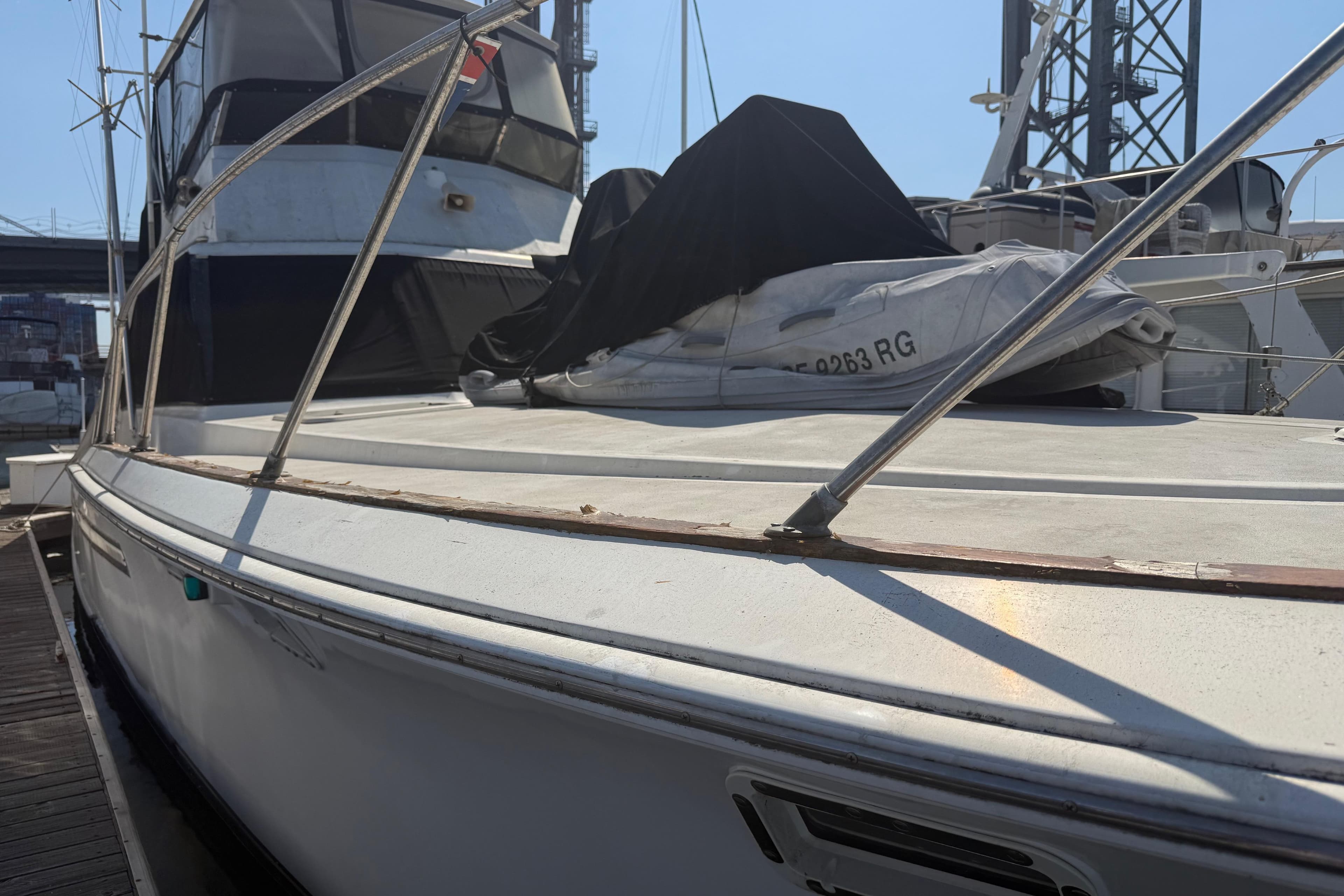 1974 Pacemaker 48 Sportfisherman yacht docked, showcasing deck and cabin details.