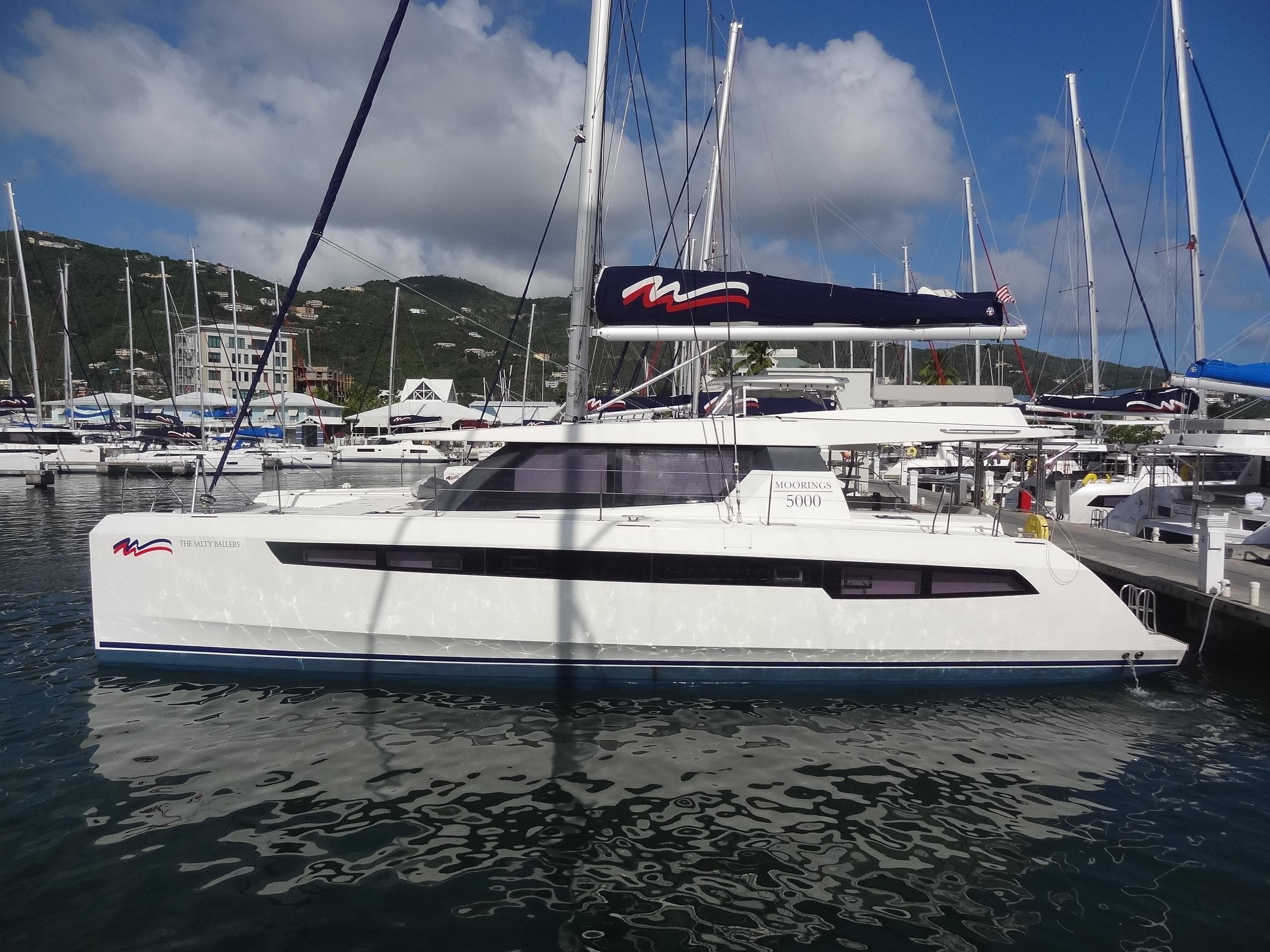 Leopard 50 catamaran yacht docked at marina, 2022 model.