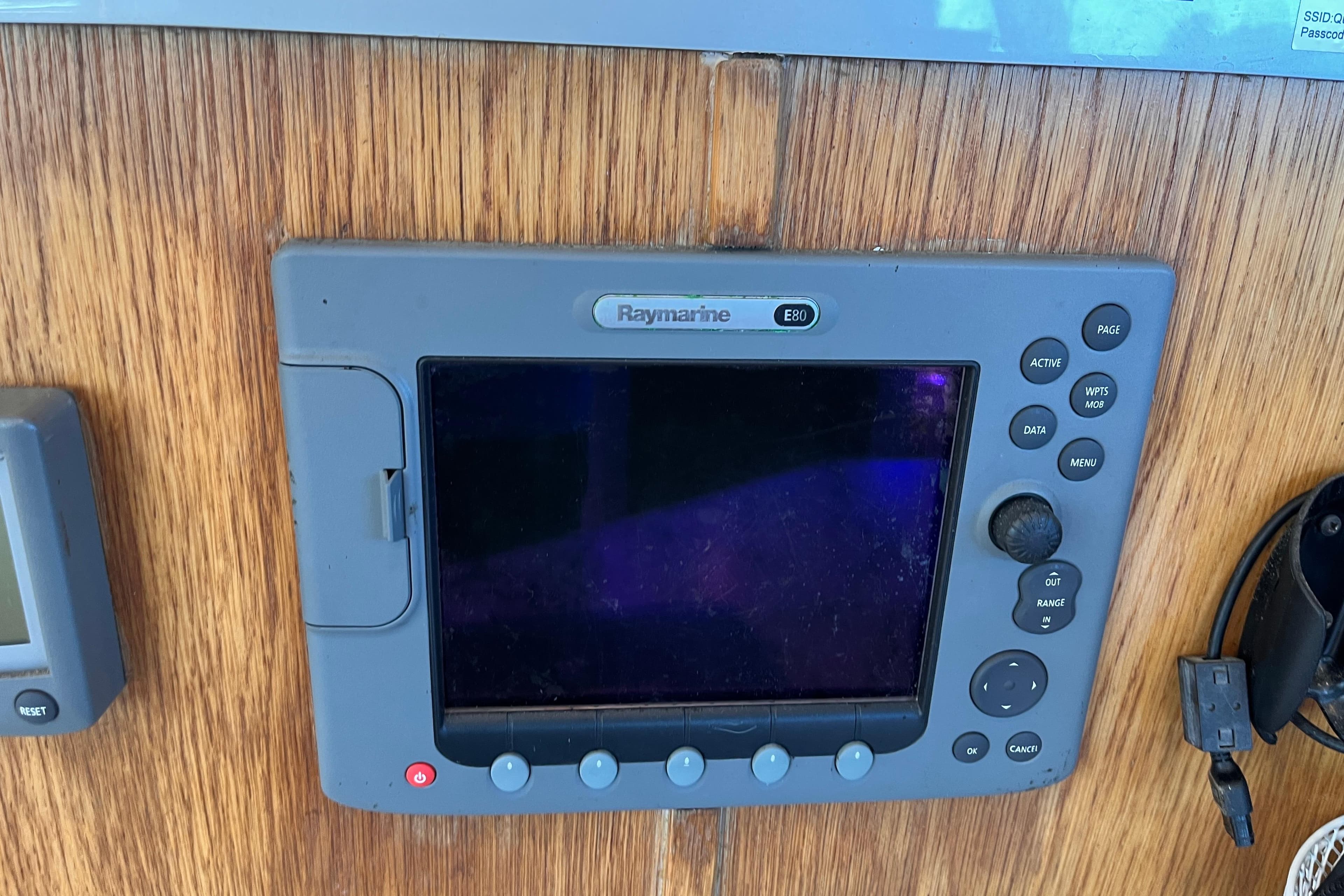 Raymarine E80 navigation system on 2008 Broadblue 415 yacht, mounted on wooden panel.