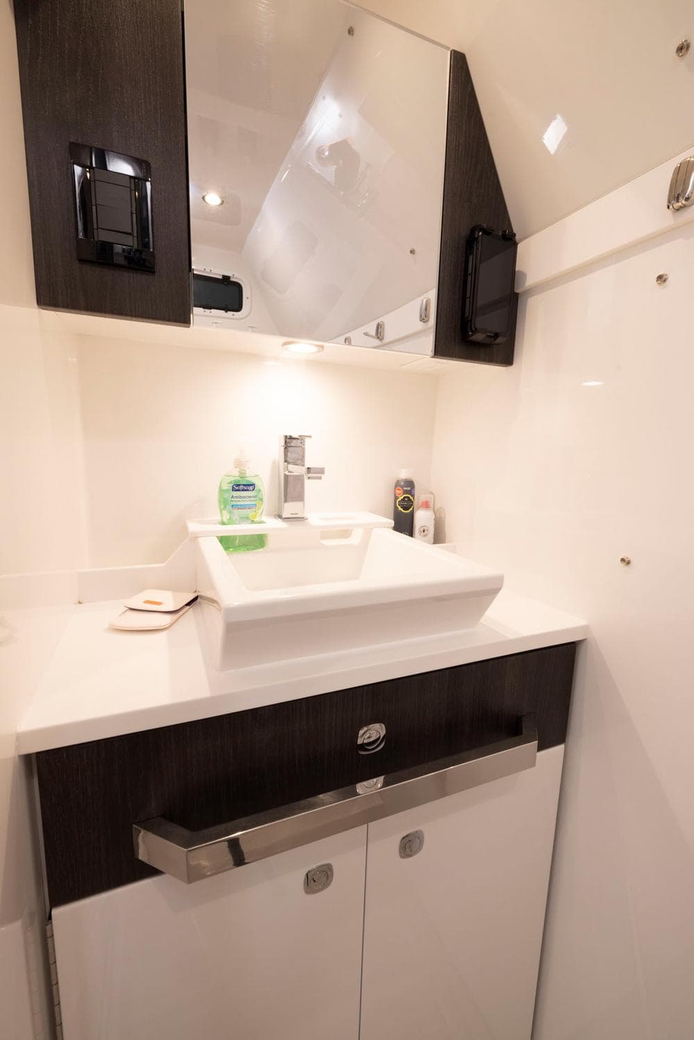 2023 Formula 387 Center Console Sport boat bathroom with modern sink and mirror.