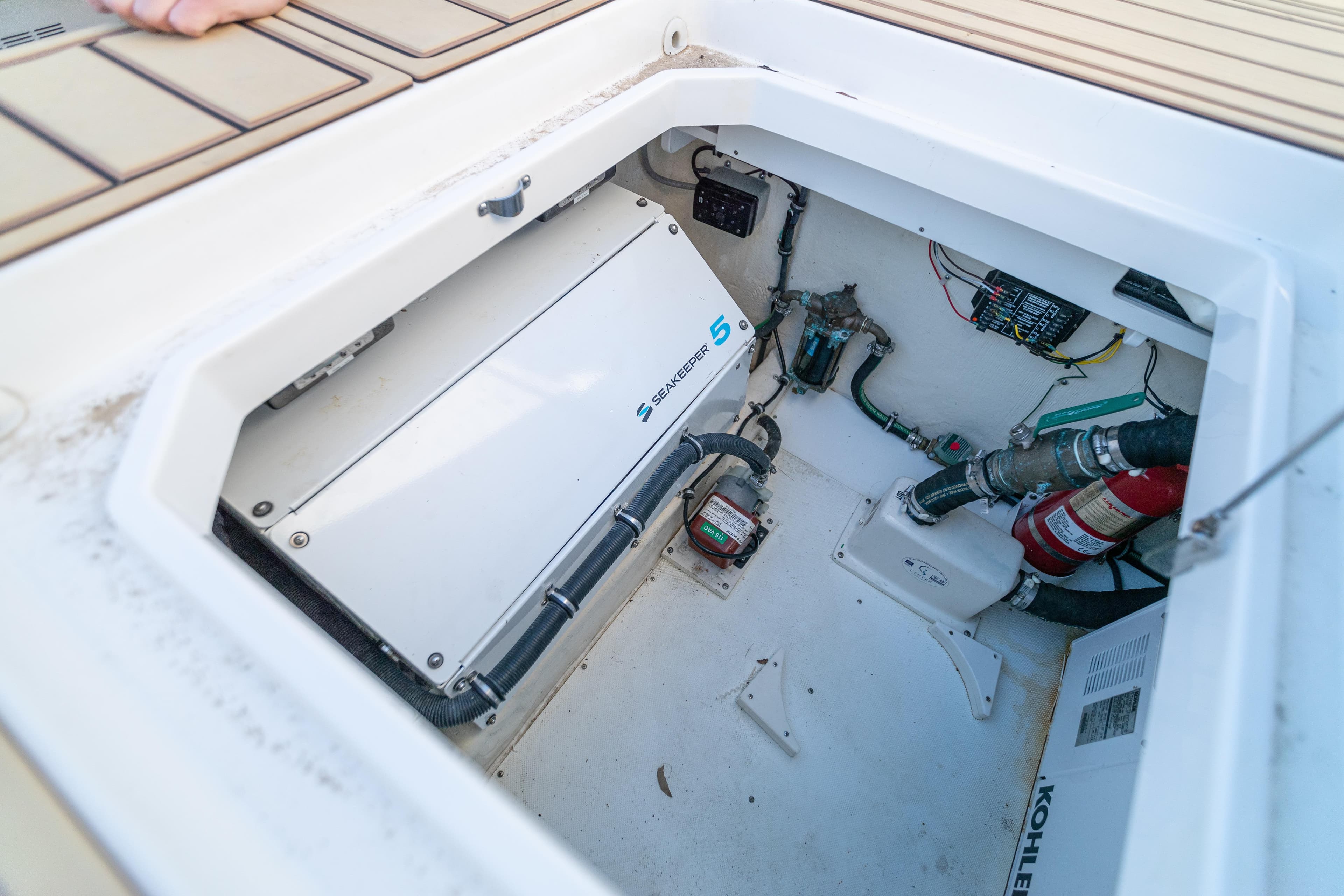Engine compartment of 2018 HCB 53 Suenos RXV with Seakeeper 5 stabilizer.