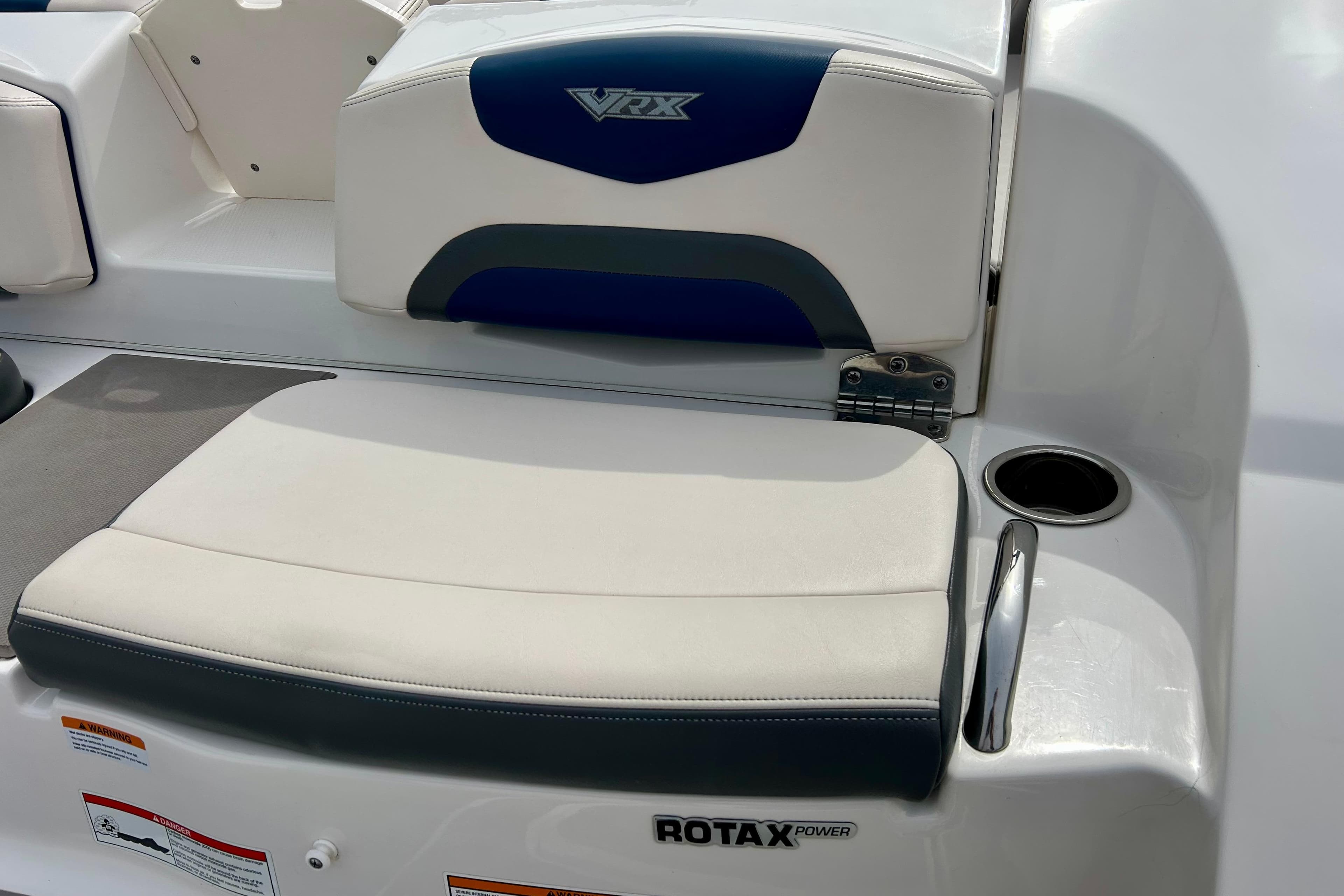 2017 Chaparral 203 Vortex boat seating with Rotax power branding and cup holder.