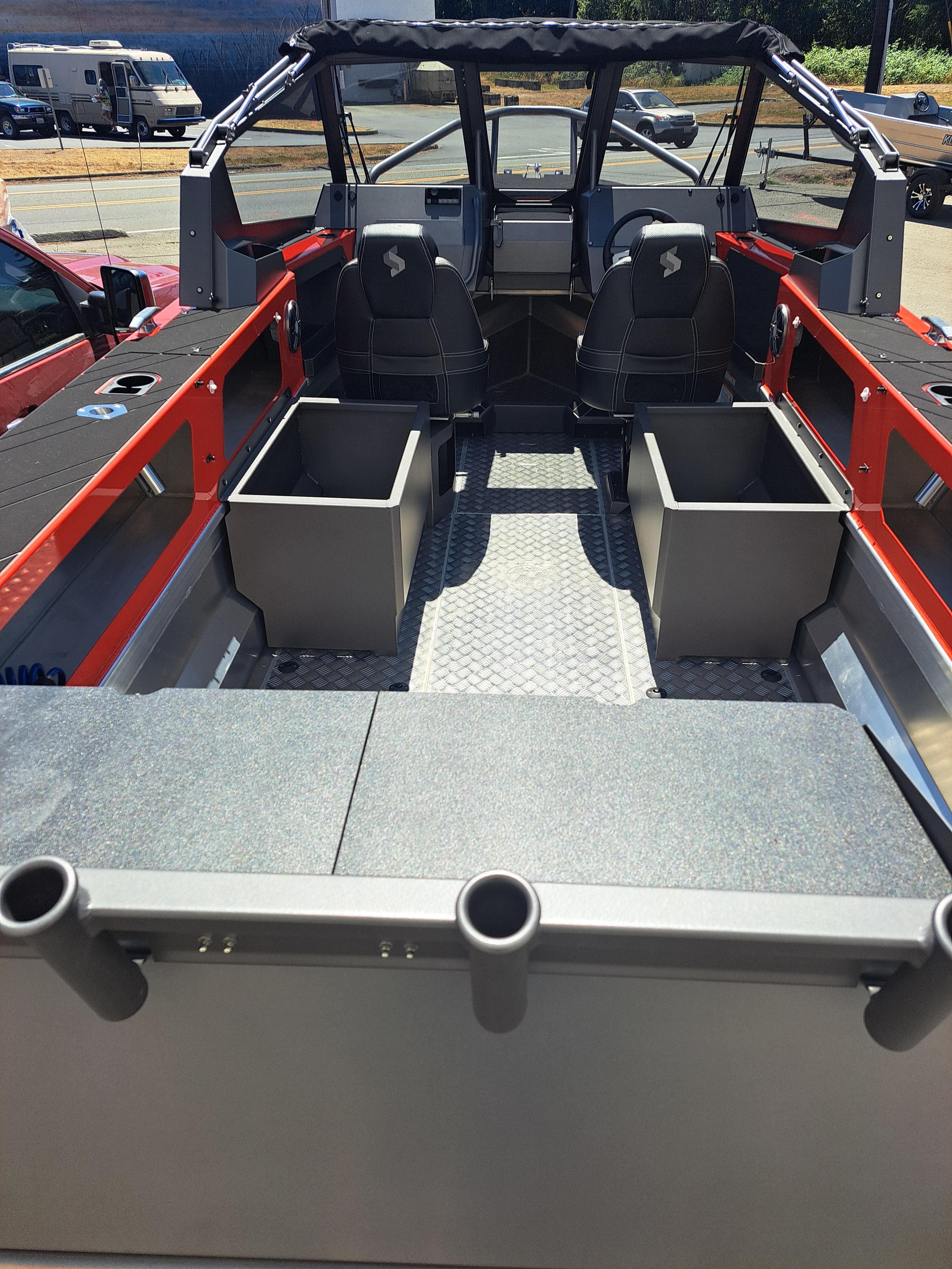 2024 Stabicraft Treker Profish boat interior with seating and storage compartments.