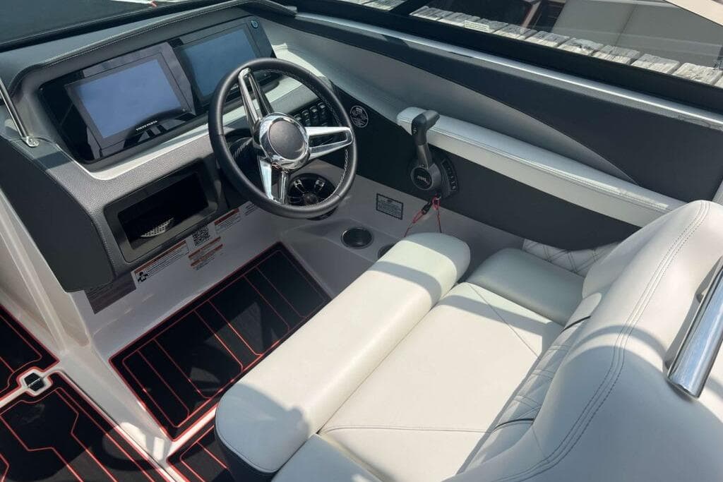 2023 Regal LS6 Surf boat interior with modern dashboard and steering wheel.