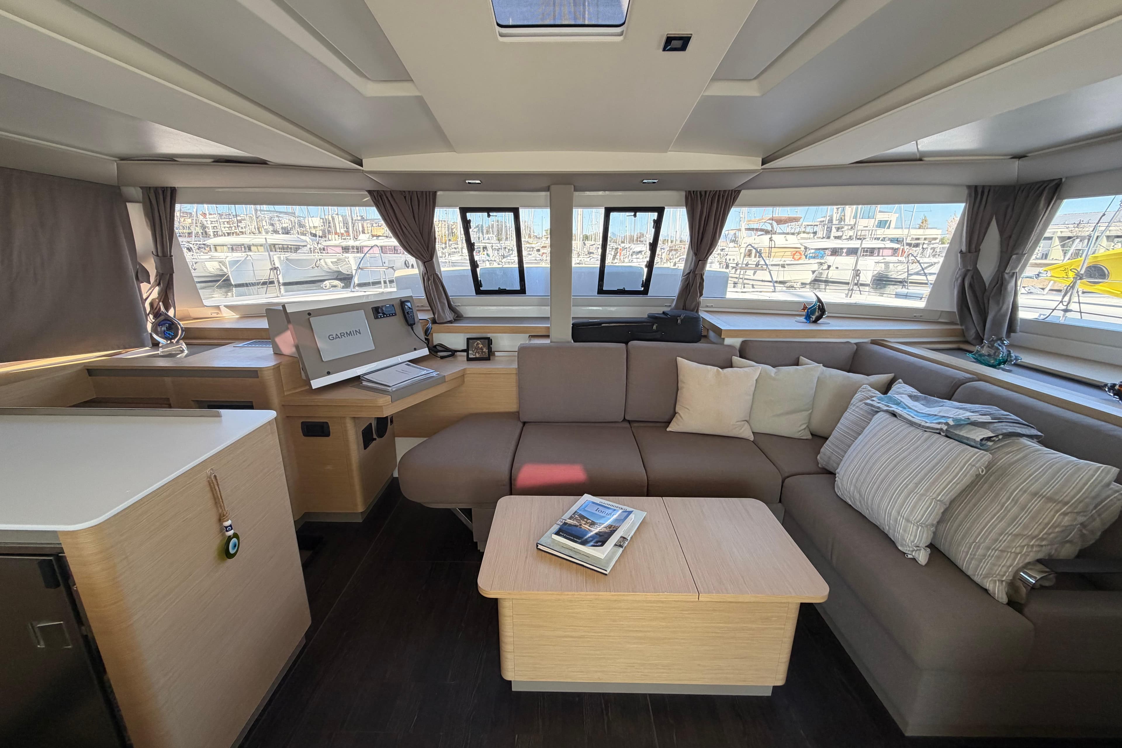 Luxurious interior of 2024 Fountaine Pajot Astrea 42 Catamaran with modern furnishings.