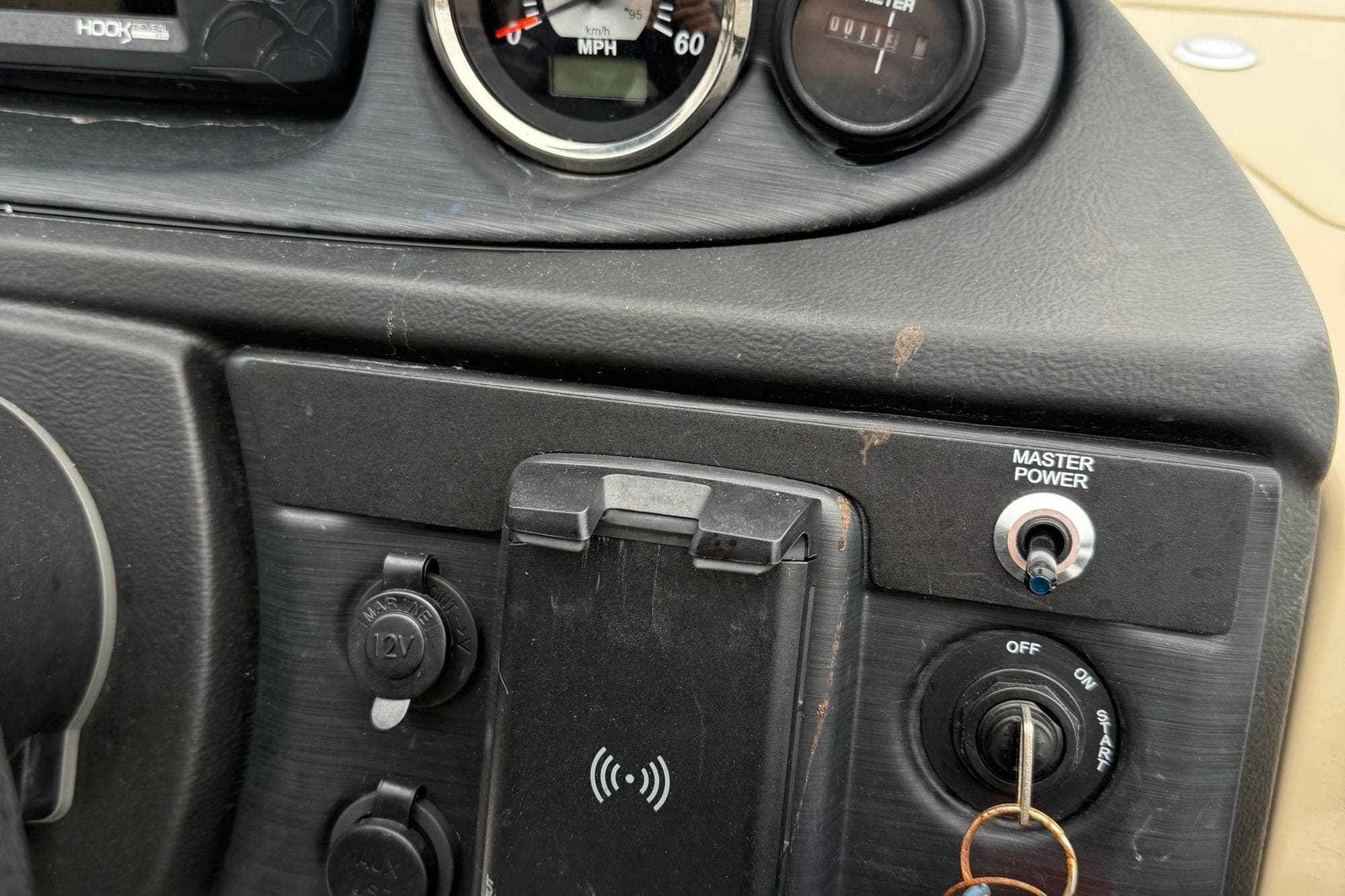 Dashboard of 2024 Berkshire 22RFX CTS with gauges and controls.