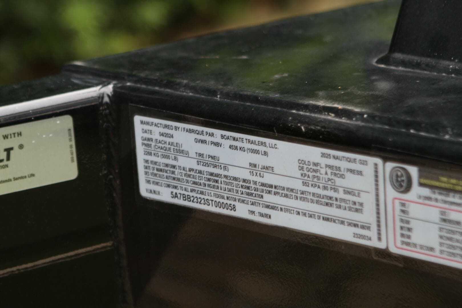 Label on 2024 Nautique Super Air Nautique G23 trailer, detailing specifications and compliance information.
