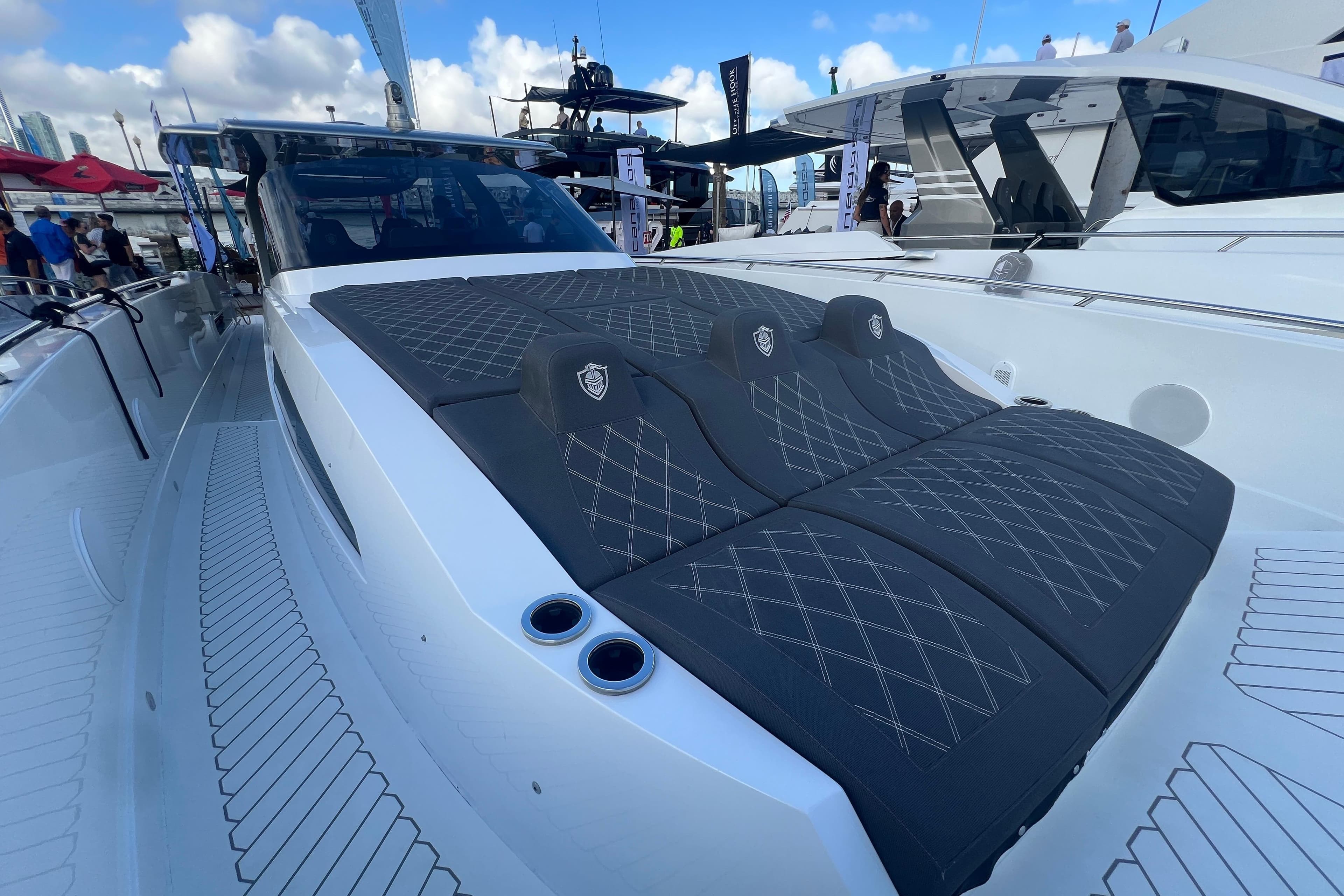 2023 Canados 493 Gladiator luxury yacht with sleek design and spacious sunbathing area.