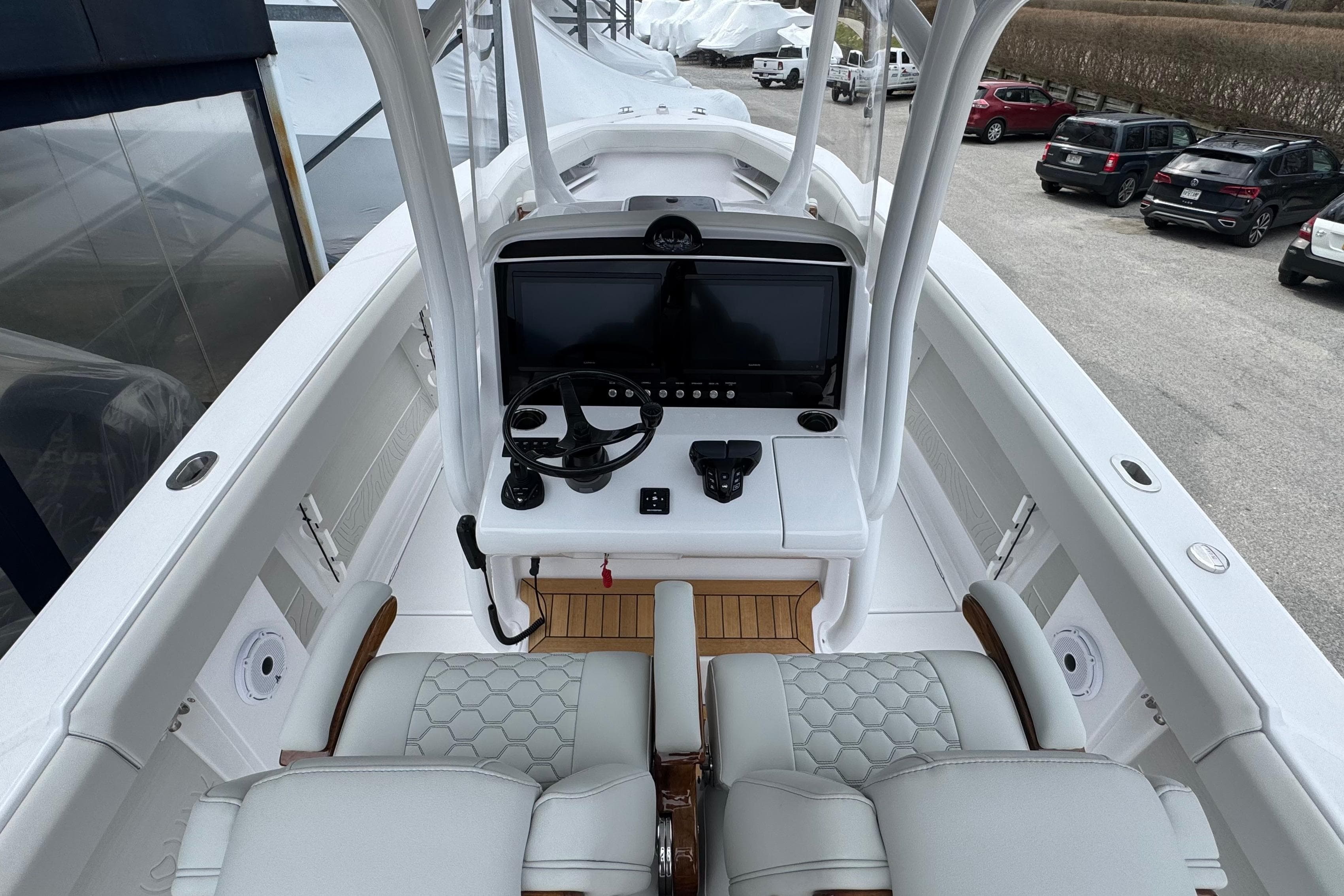 Interior view of 2026 Jupiter 30 boat cockpit with modern steering and controls.