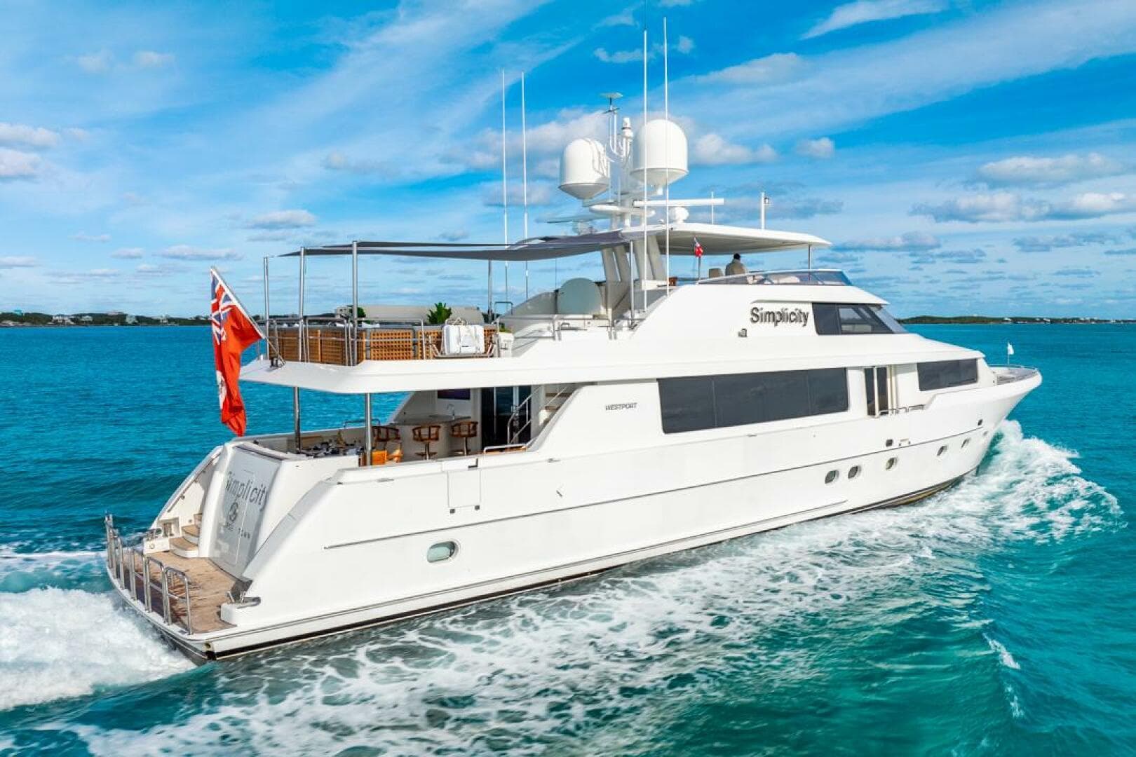 Luxury Westport 112 yacht cruising on blue ocean, 2012 model.