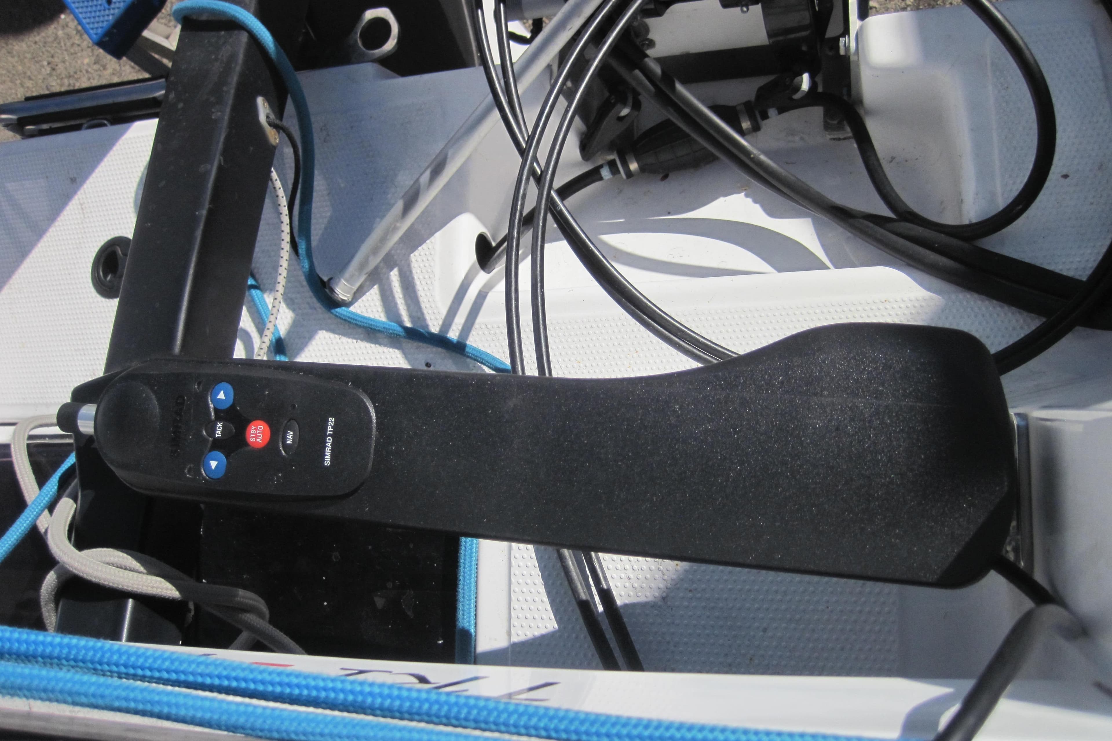 Cockpit controls of 2022 Corsair 880 Standard sailboat with steering mechanism.