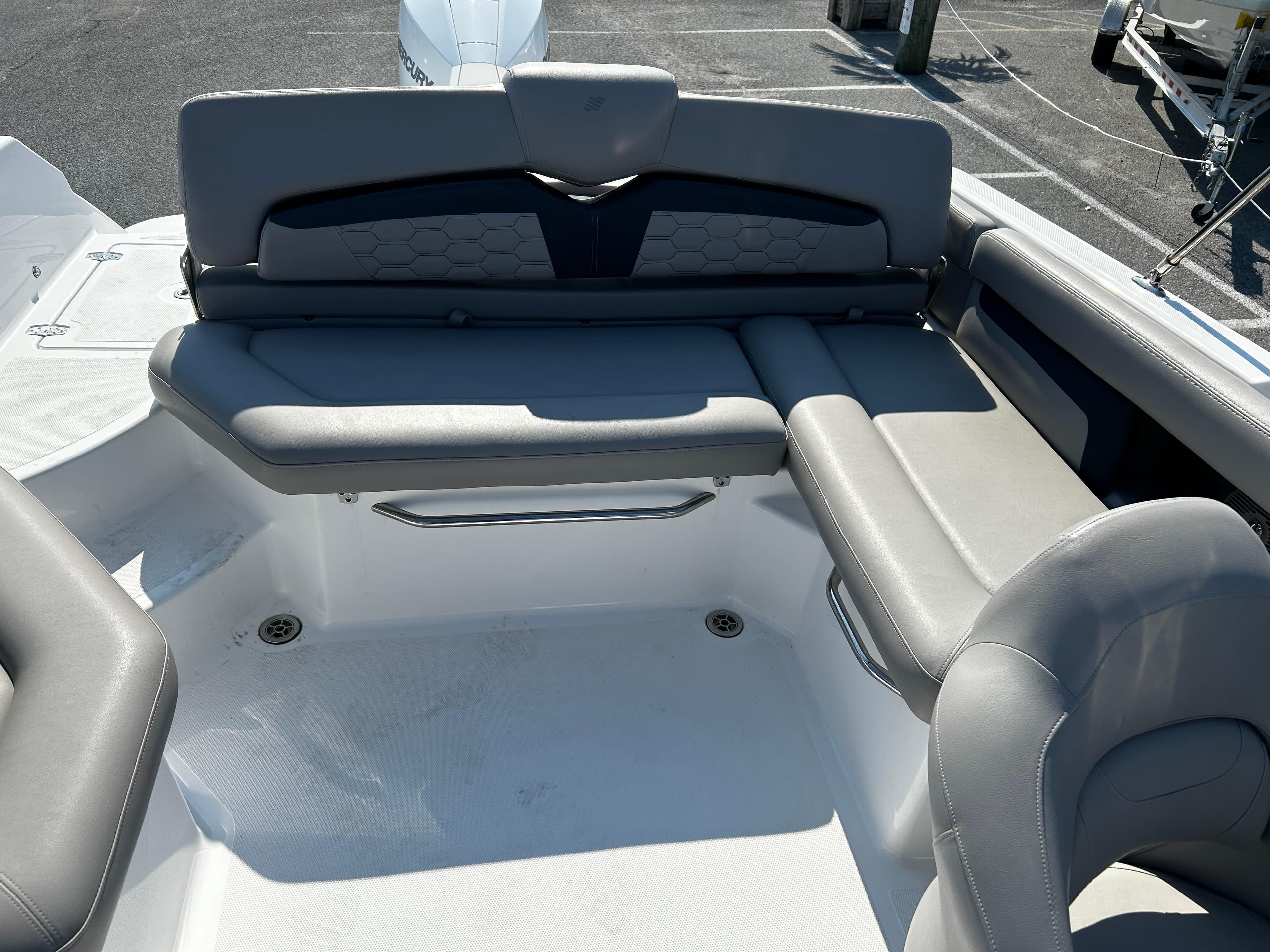 2023 Four Winns HD3 OB boat interior with gray seating and modern design.
