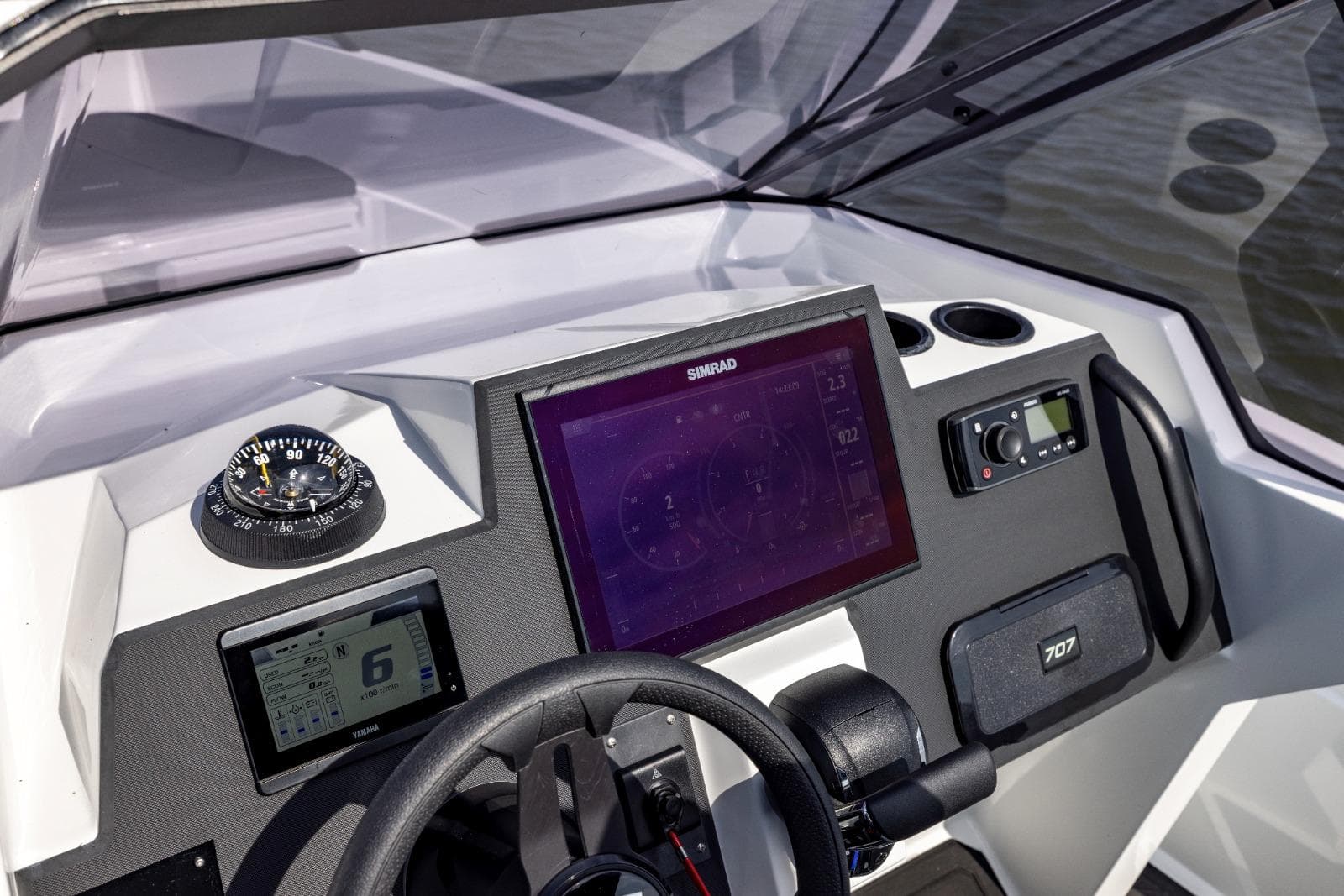 Cockpit of 2022 Iron 707 boat with modern navigation and control systems.