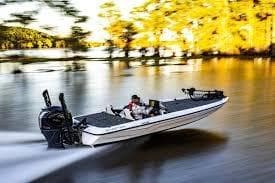 2026 Skeeter ZXE21 boat speeding on a scenic lake with blurred background.