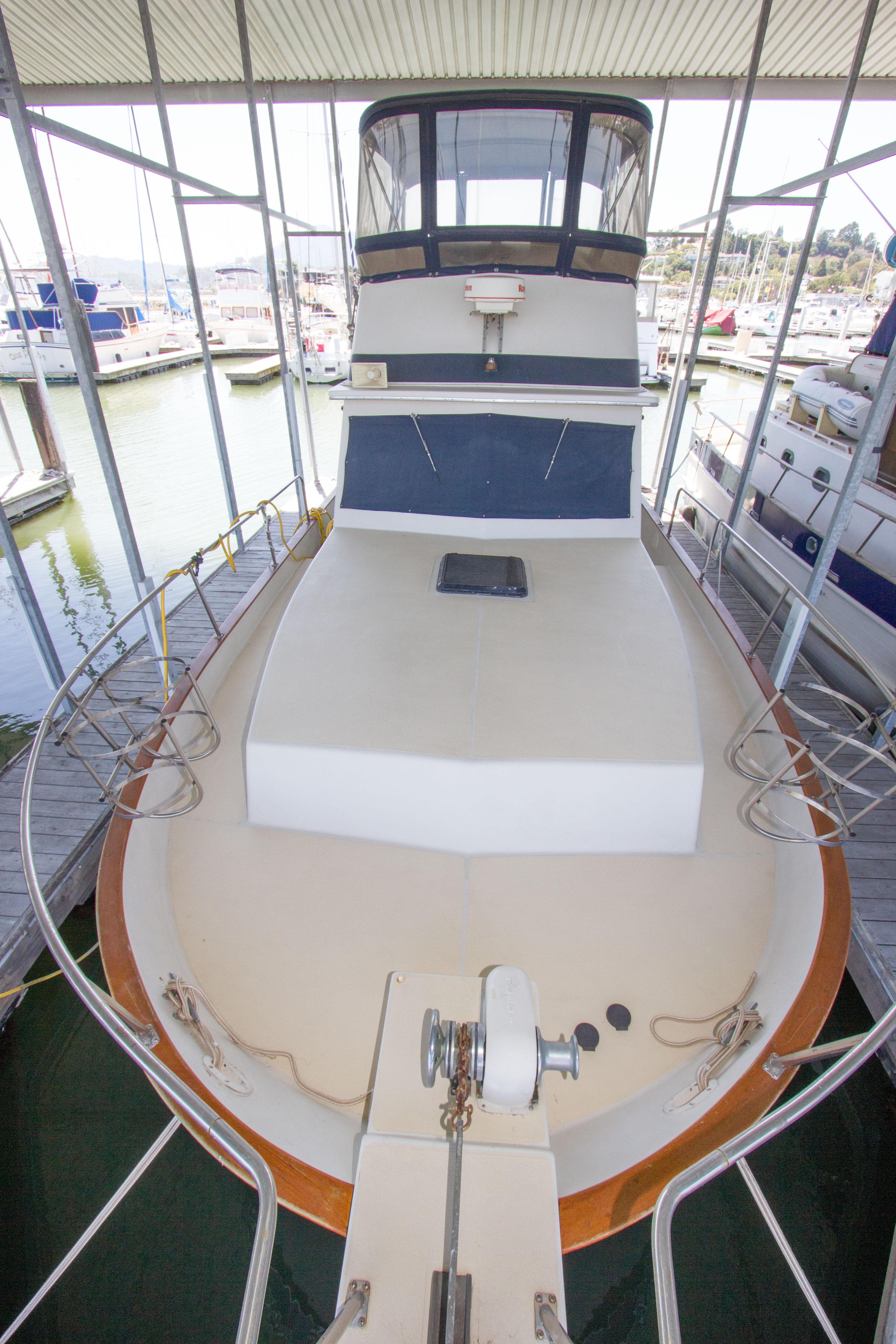 1984 Californian LRC yacht docked, front view.