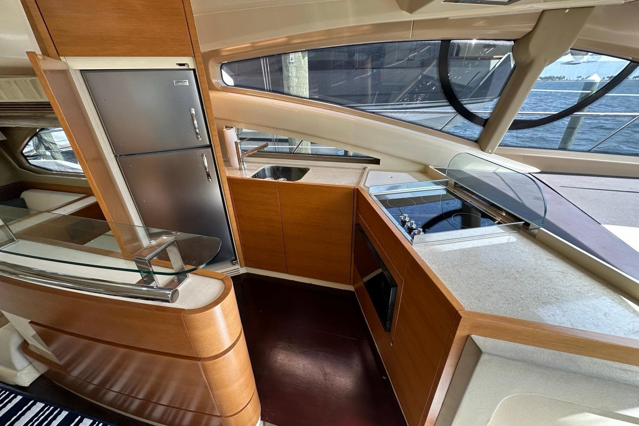 Luxurious kitchen interior of 2013 Azimut Fly 53 yacht with modern appliances and sleek design.