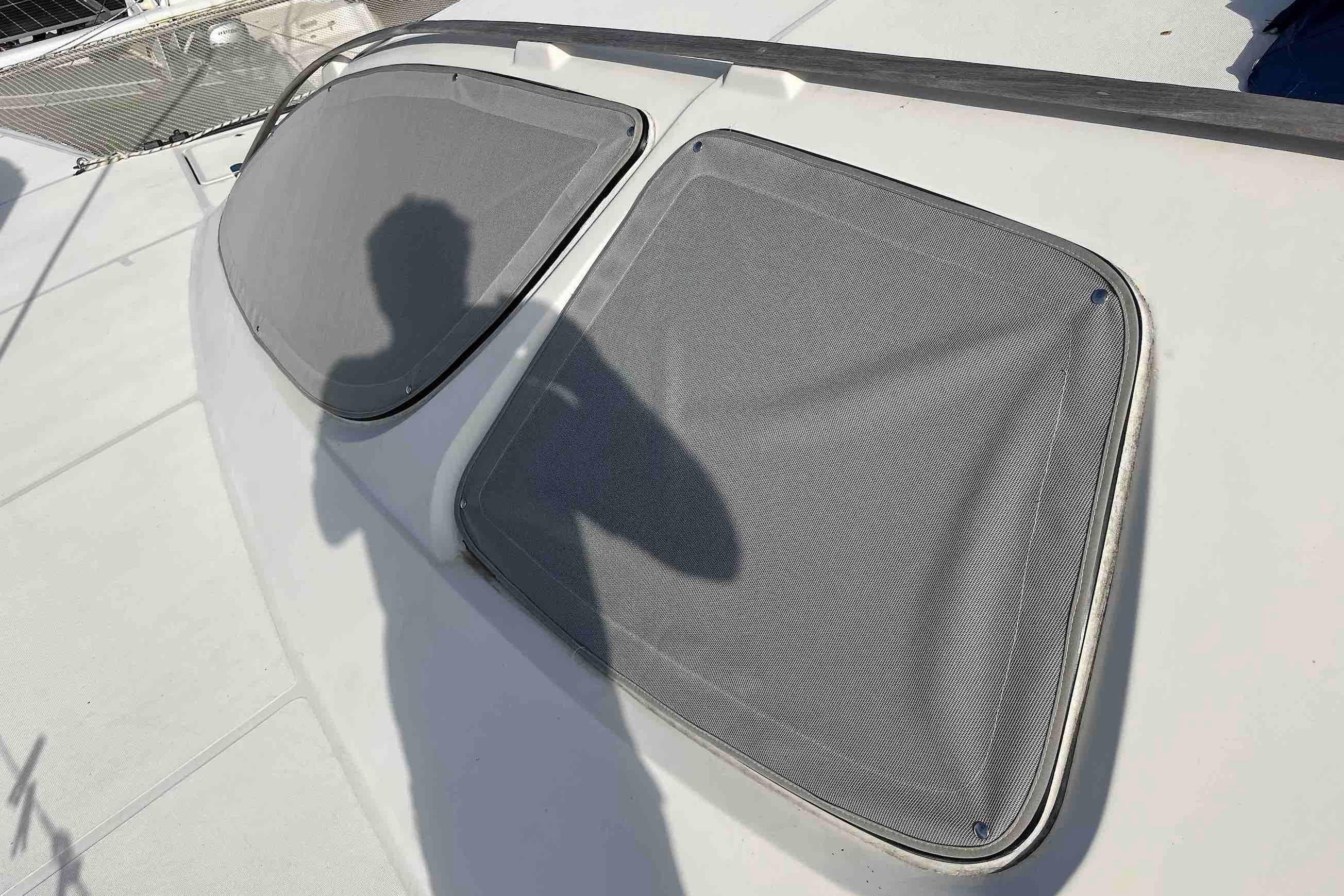 Shadow on Catana 471 yacht deck with covered windows, 2004 model.