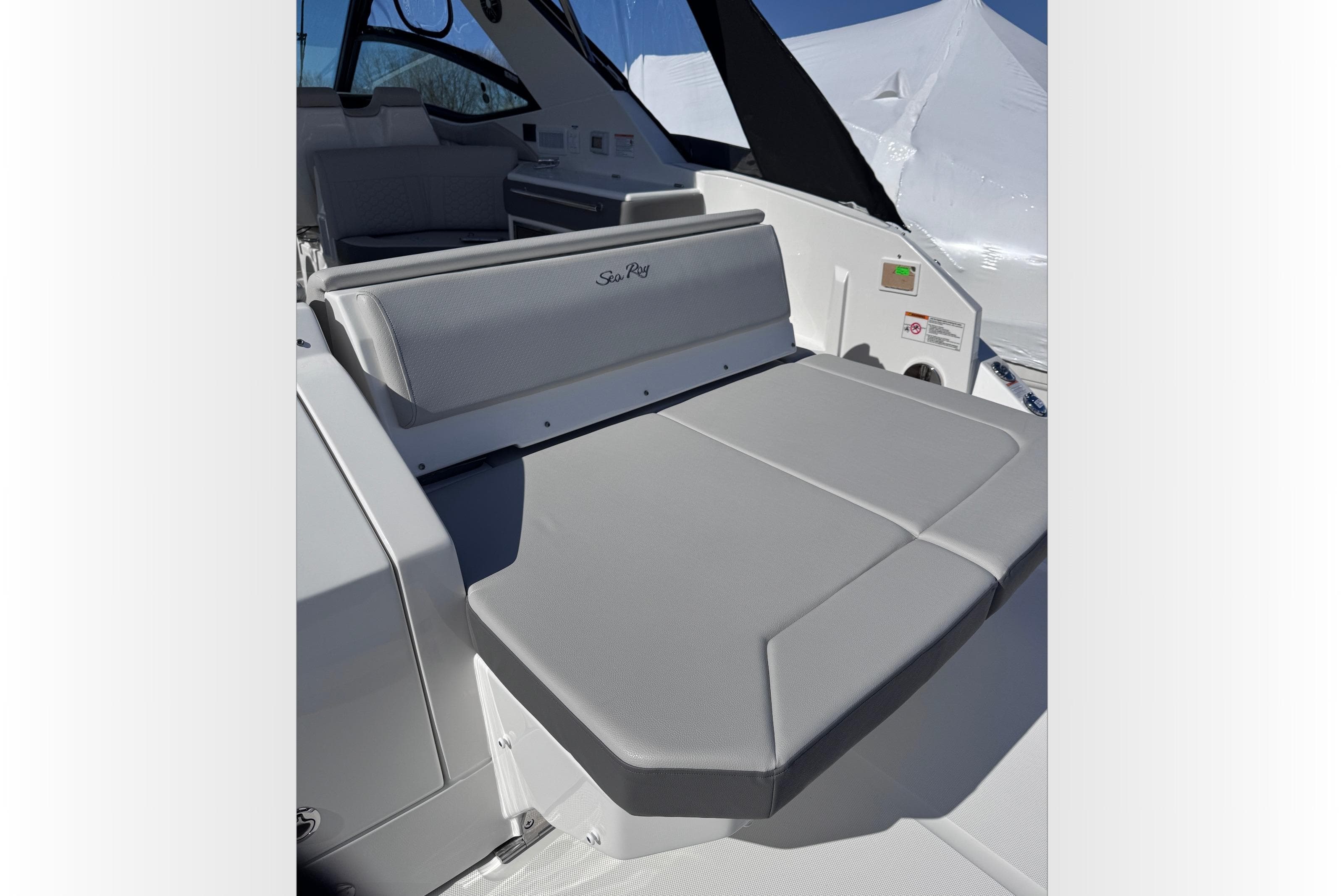 2025 Sea Ray Sundancer 320 boat interior with gray seating and sleek design.