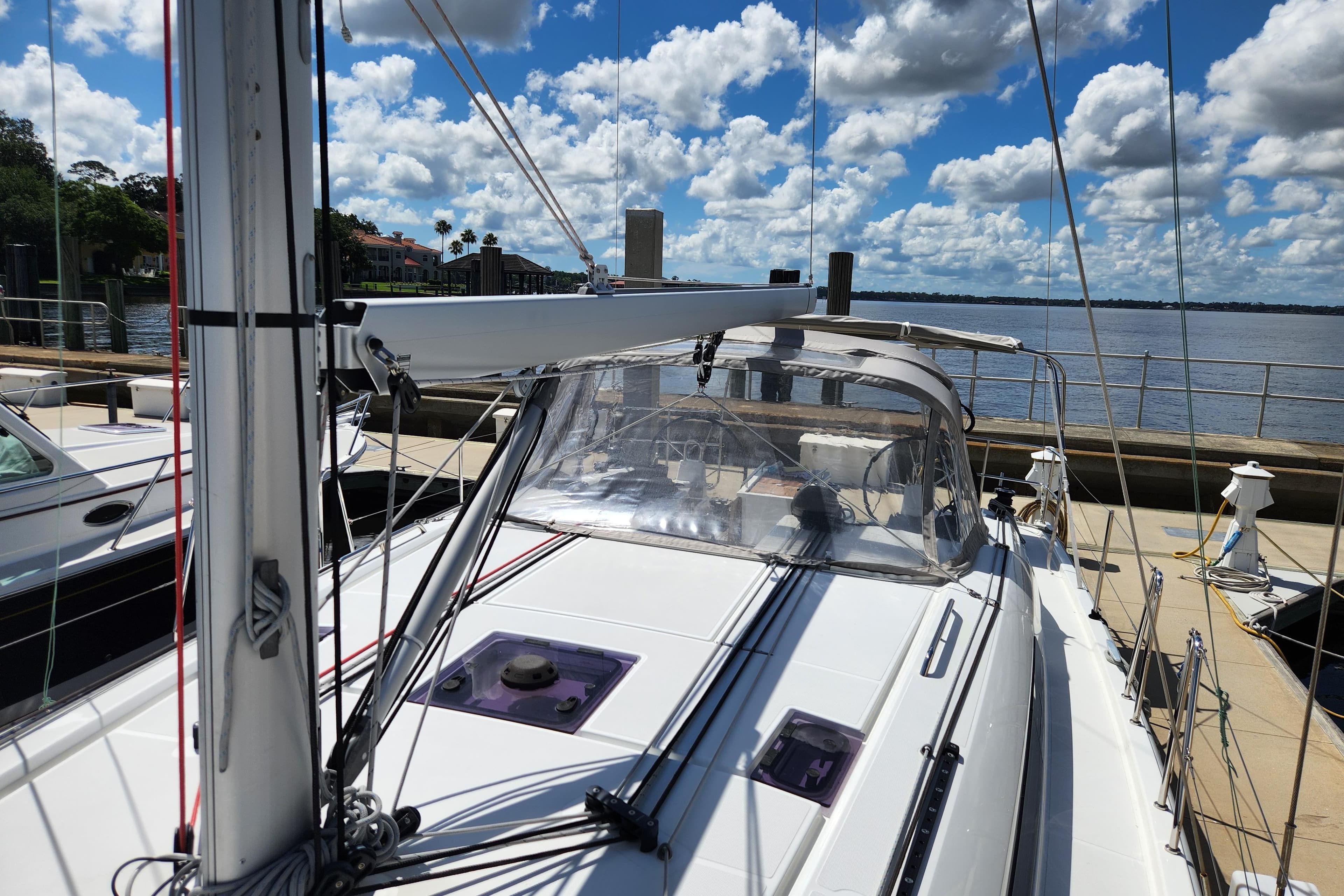 2022 Beneteau Oceanis 40.1 sailboat docked, showcasing sleek design and clear skies.