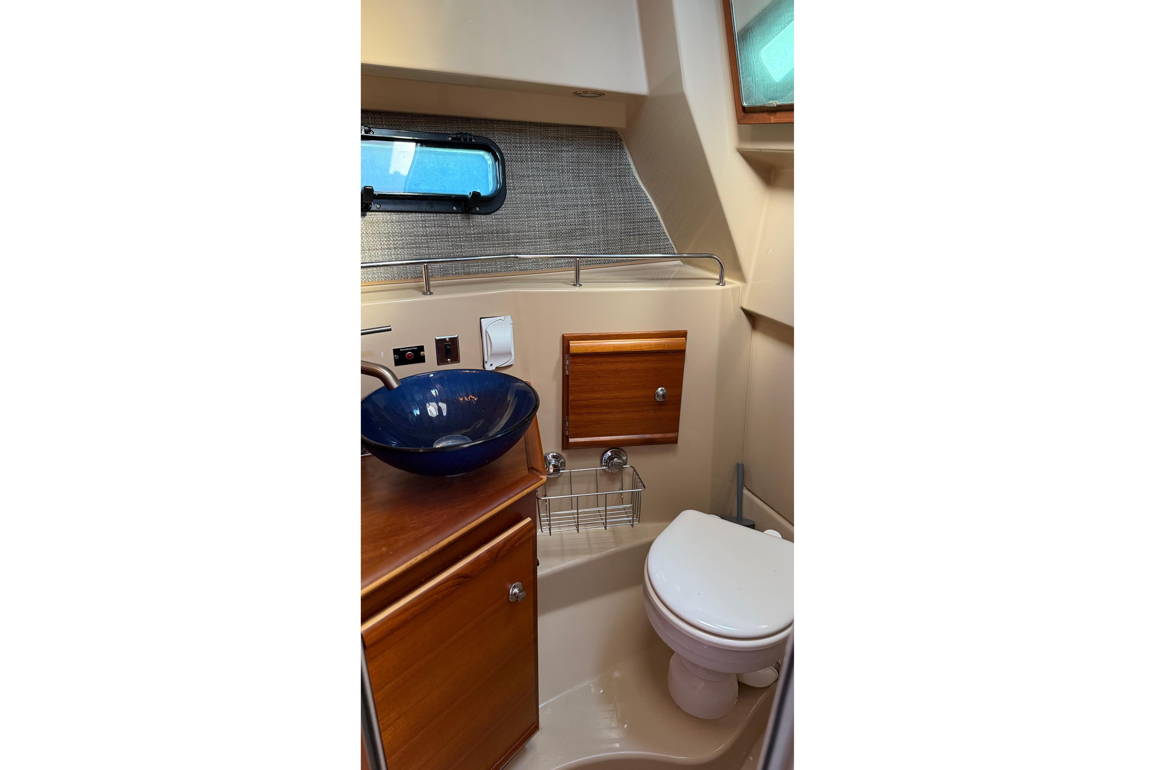 2019 Ranger Tugs R-27 boat bathroom with modern sink and toilet.