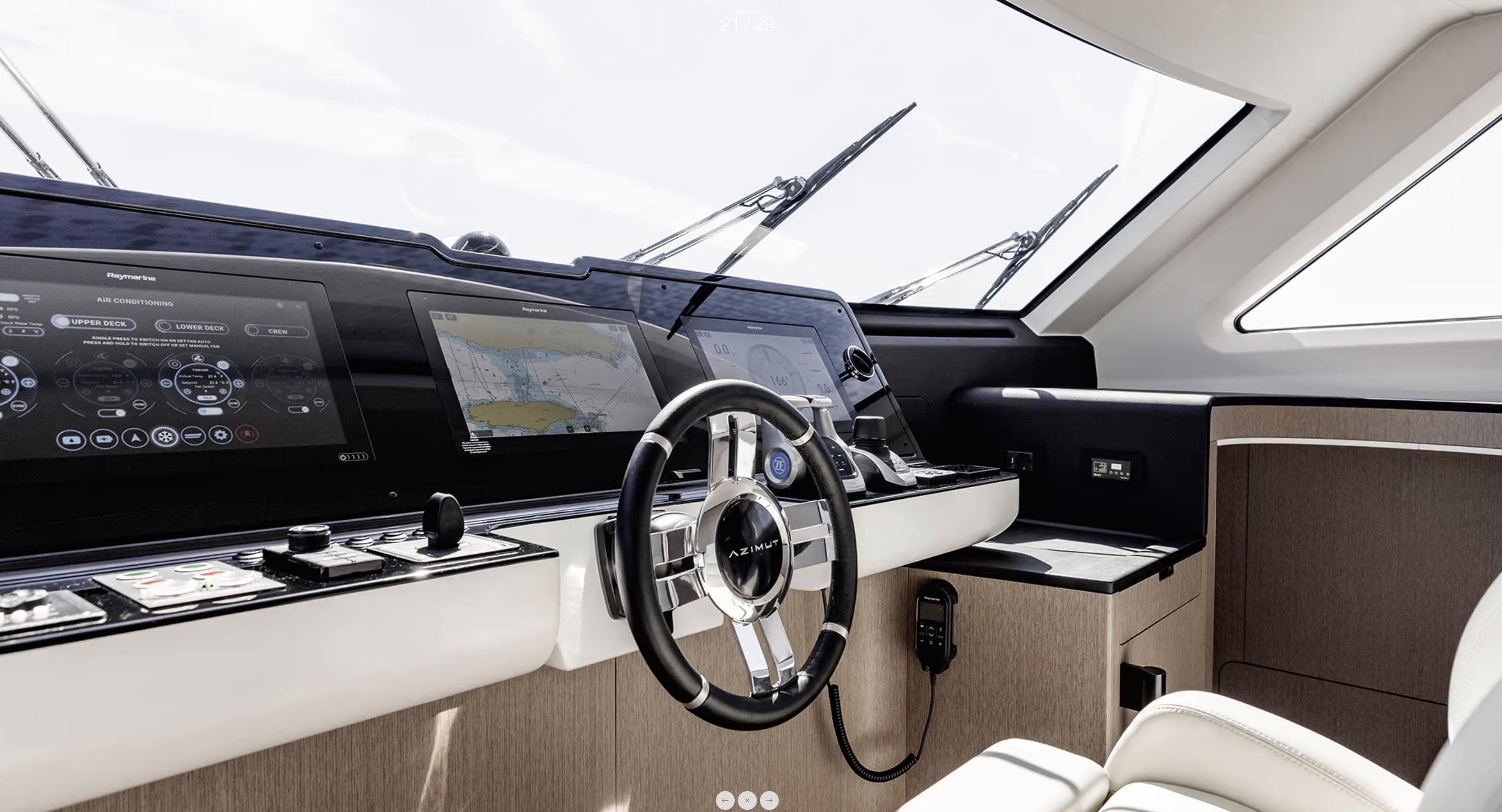 Luxurious helm of 2025 Azimut Grande 26M yacht with advanced navigation systems.