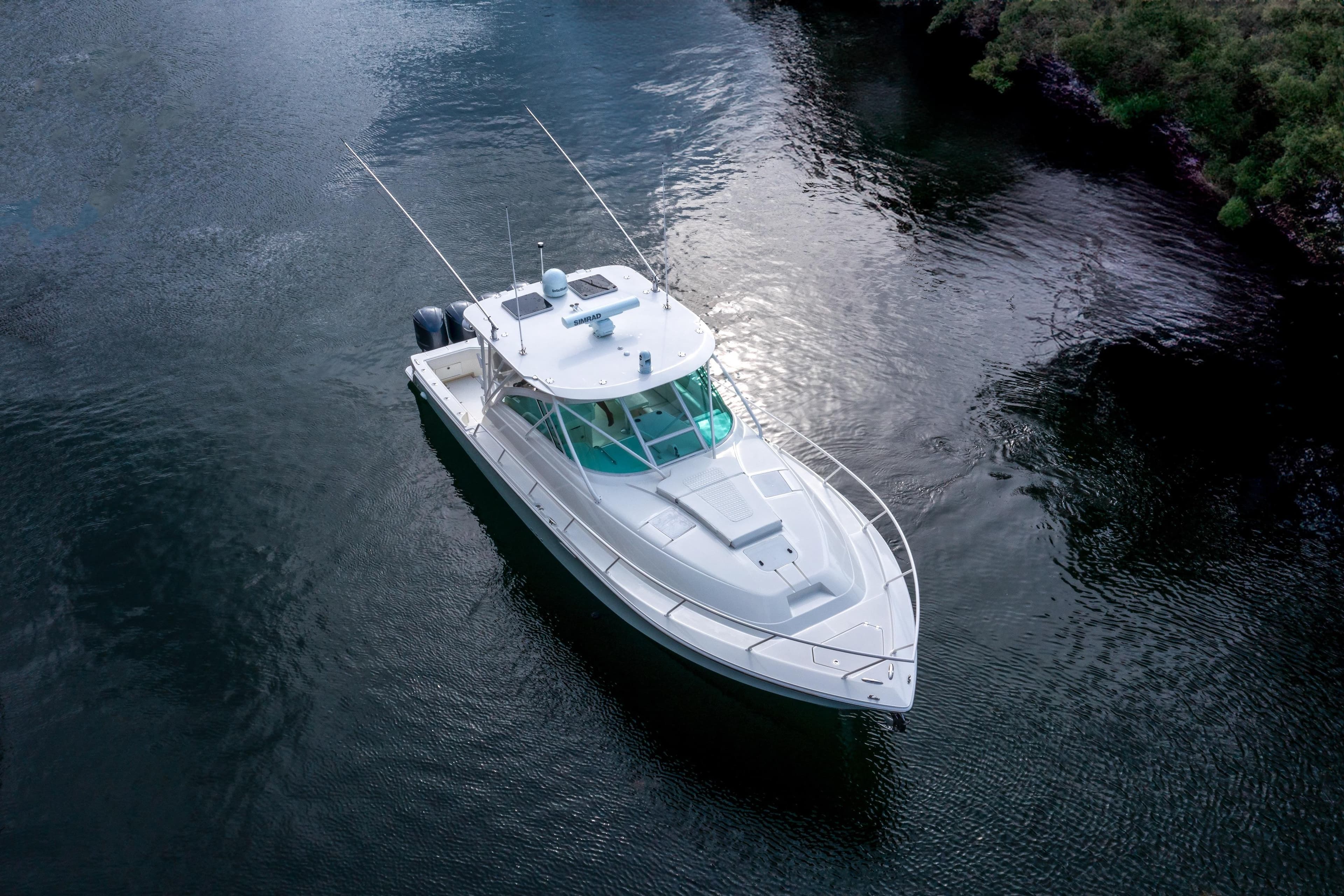 2011 SeaVee 430 Sport Express boat on calm water, aerial view.