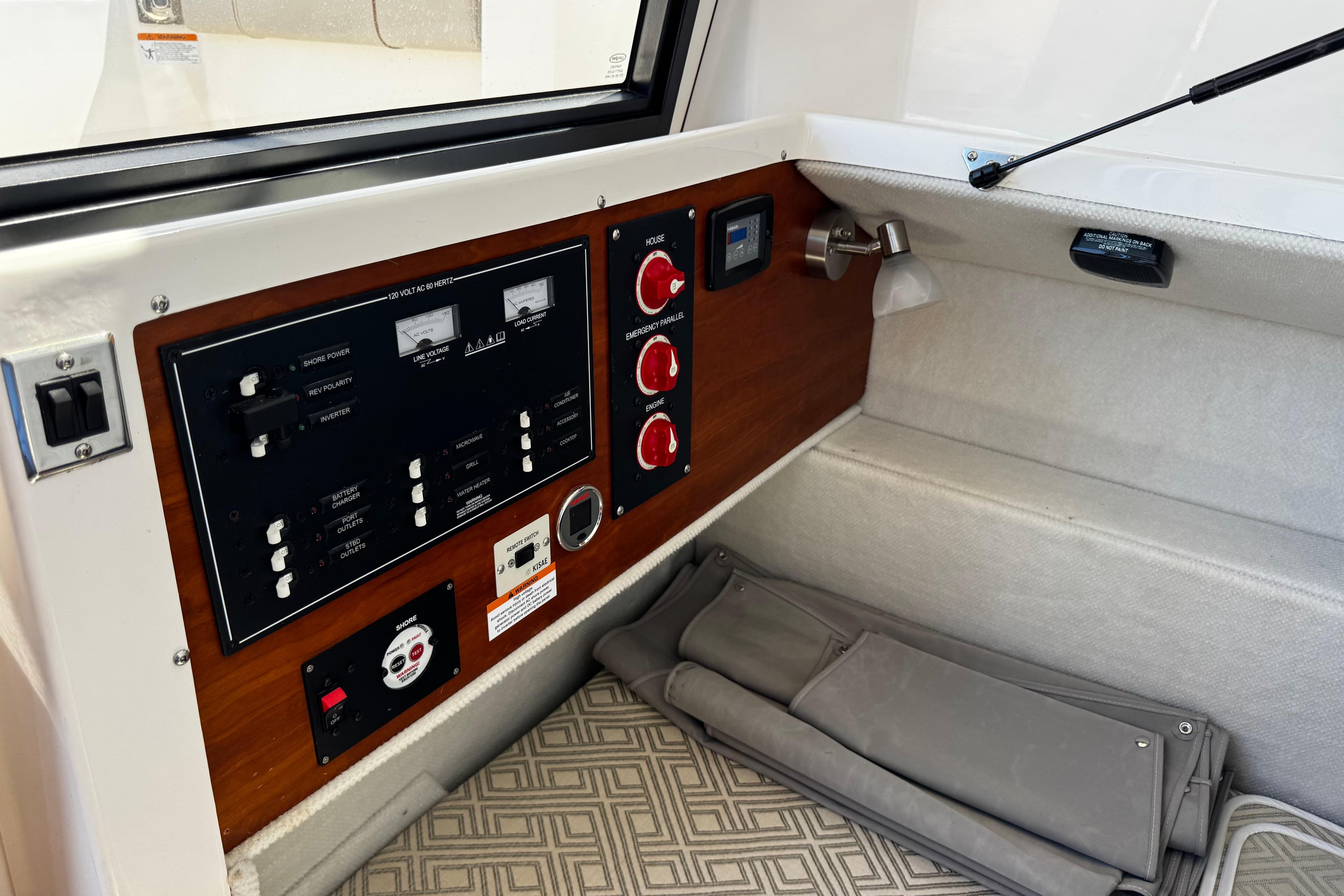 2022 Cutwater C-248 Coupe interior control panel with switches and gauges.