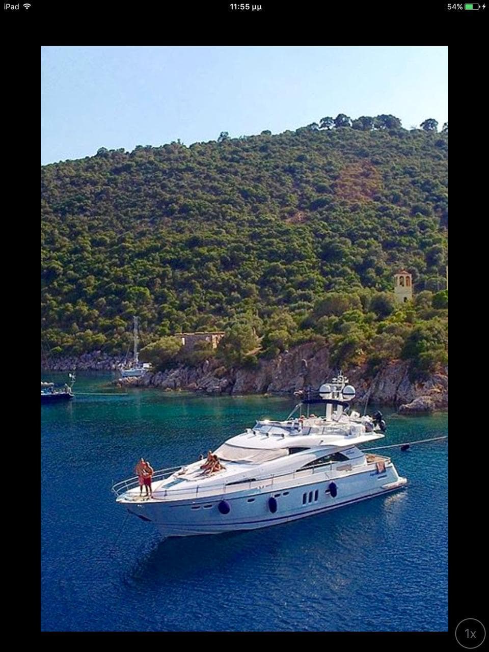 2008 Fairline Squadron 68 yacht cruising in scenic coastal waters.