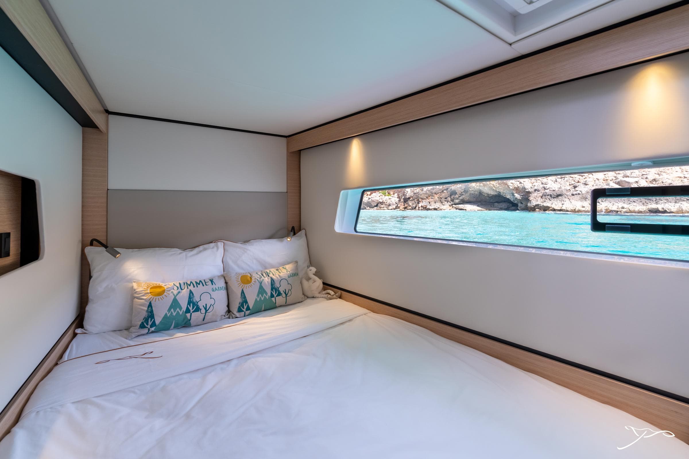 Luxurious cabin interior of 2025 Nautitech 44 Open yacht with scenic ocean view.