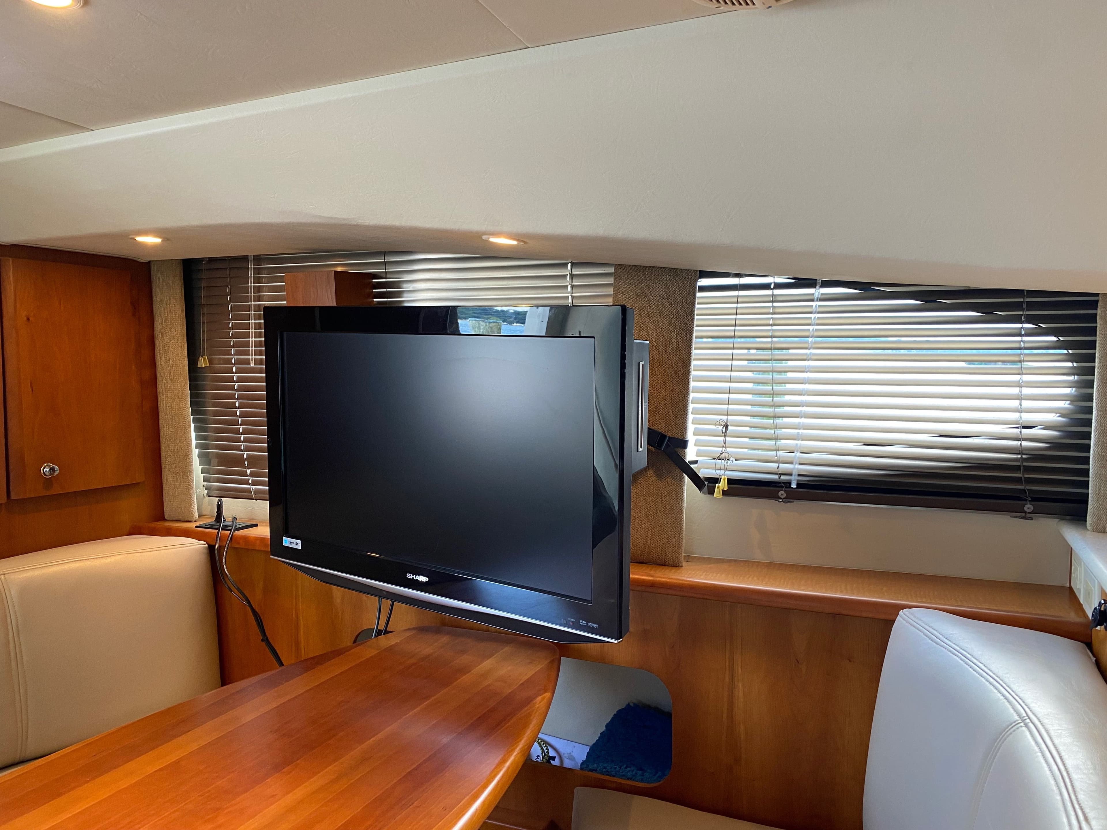 Interior of a 2002 Silverton 330 yacht with TV.