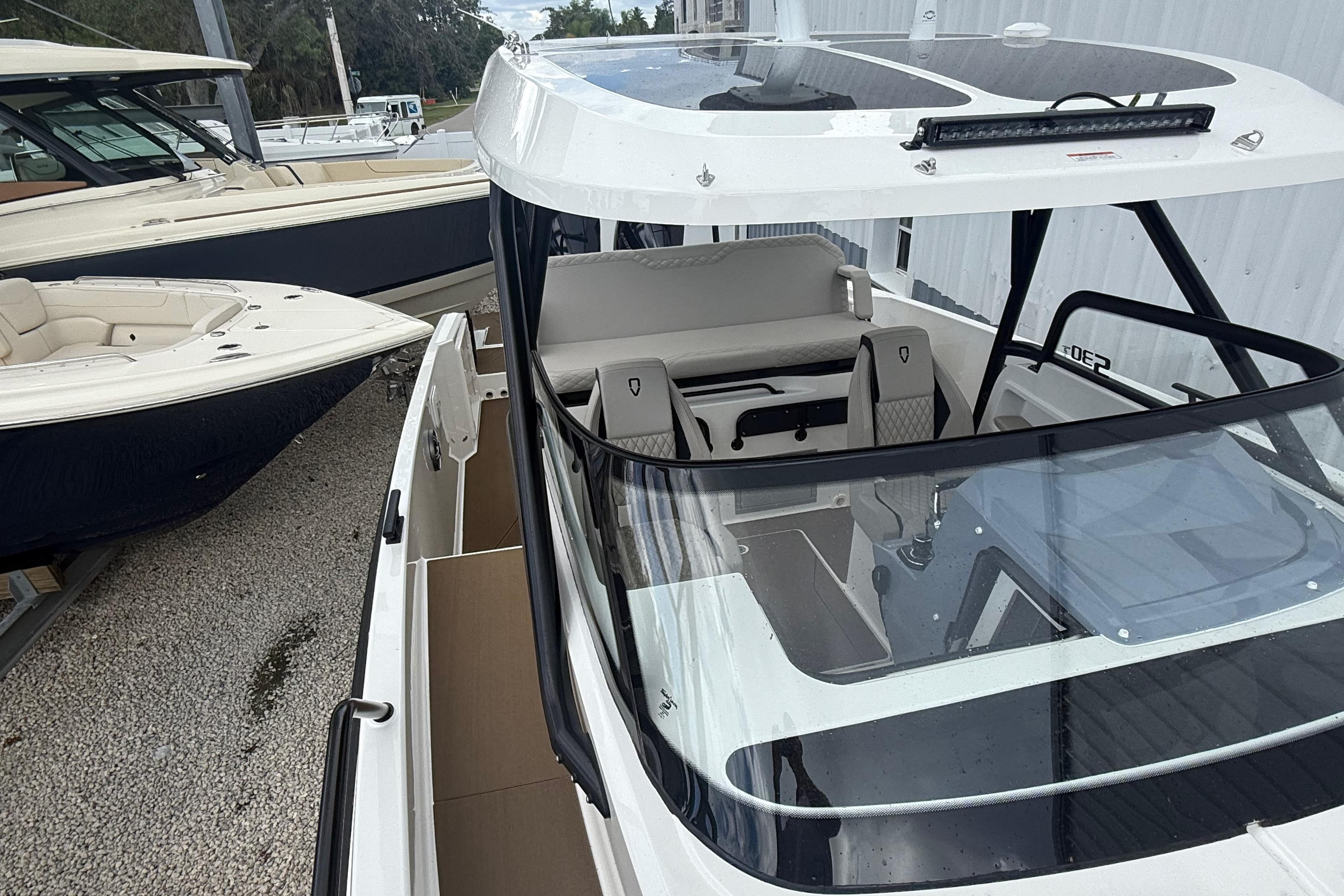 2026 Navan S30 boat with sleek design and modern interior, docked outdoors.