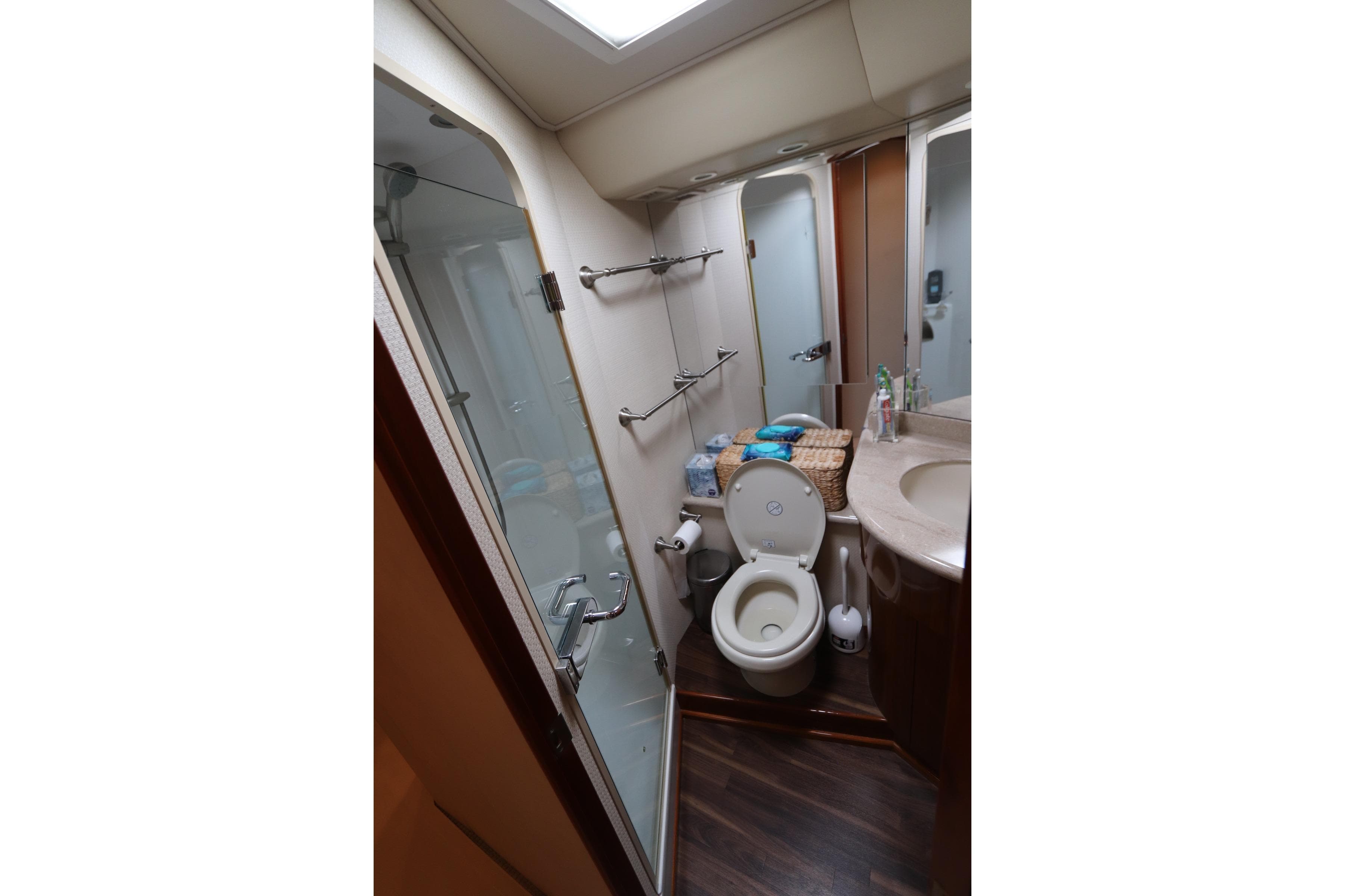 Bathroom interior of 2011 Viking 46 Convertible yacht with shower and toilet.