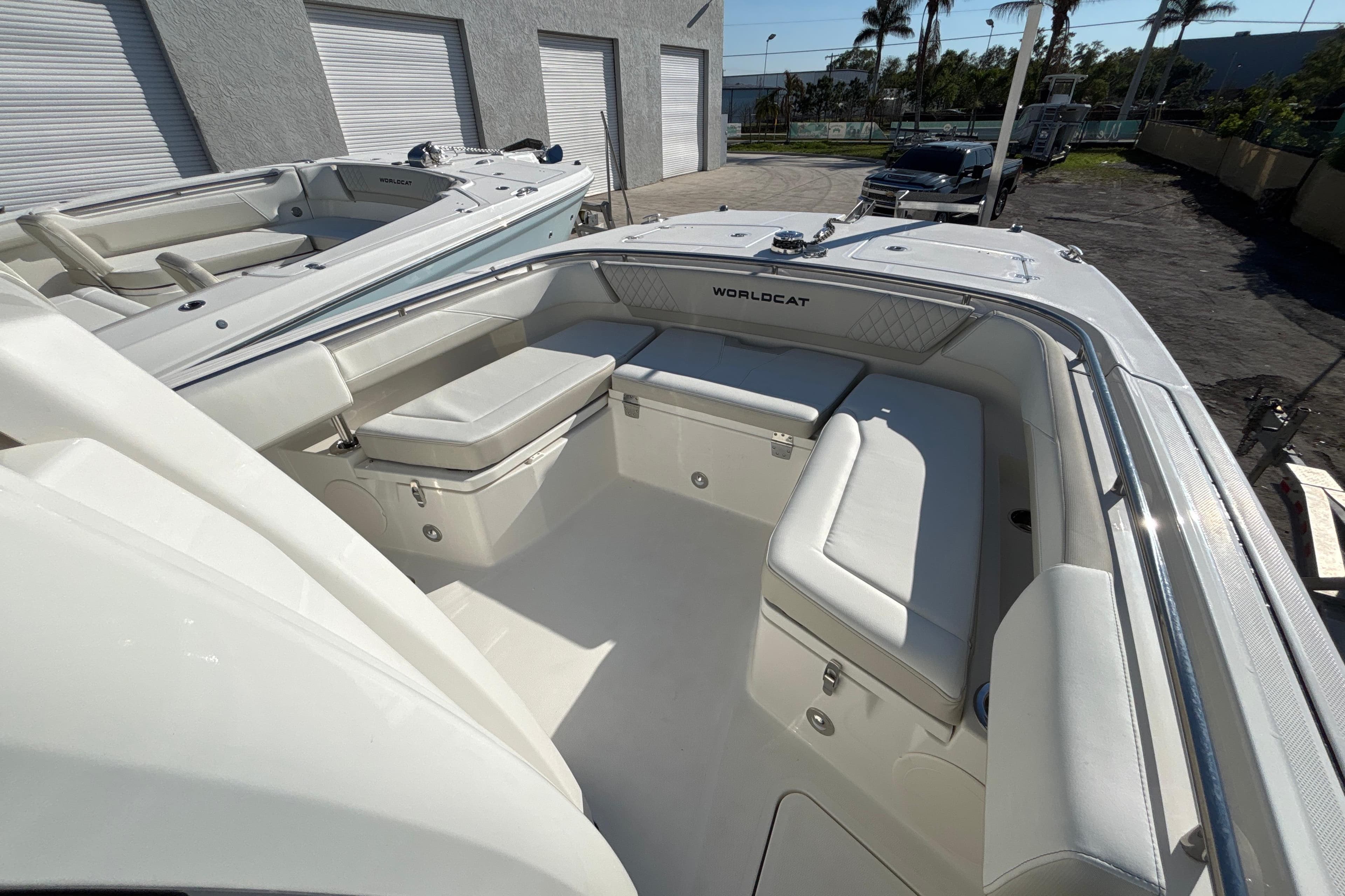 2026 World Cat 265 CC-X boat interior with white seating and sleek design.