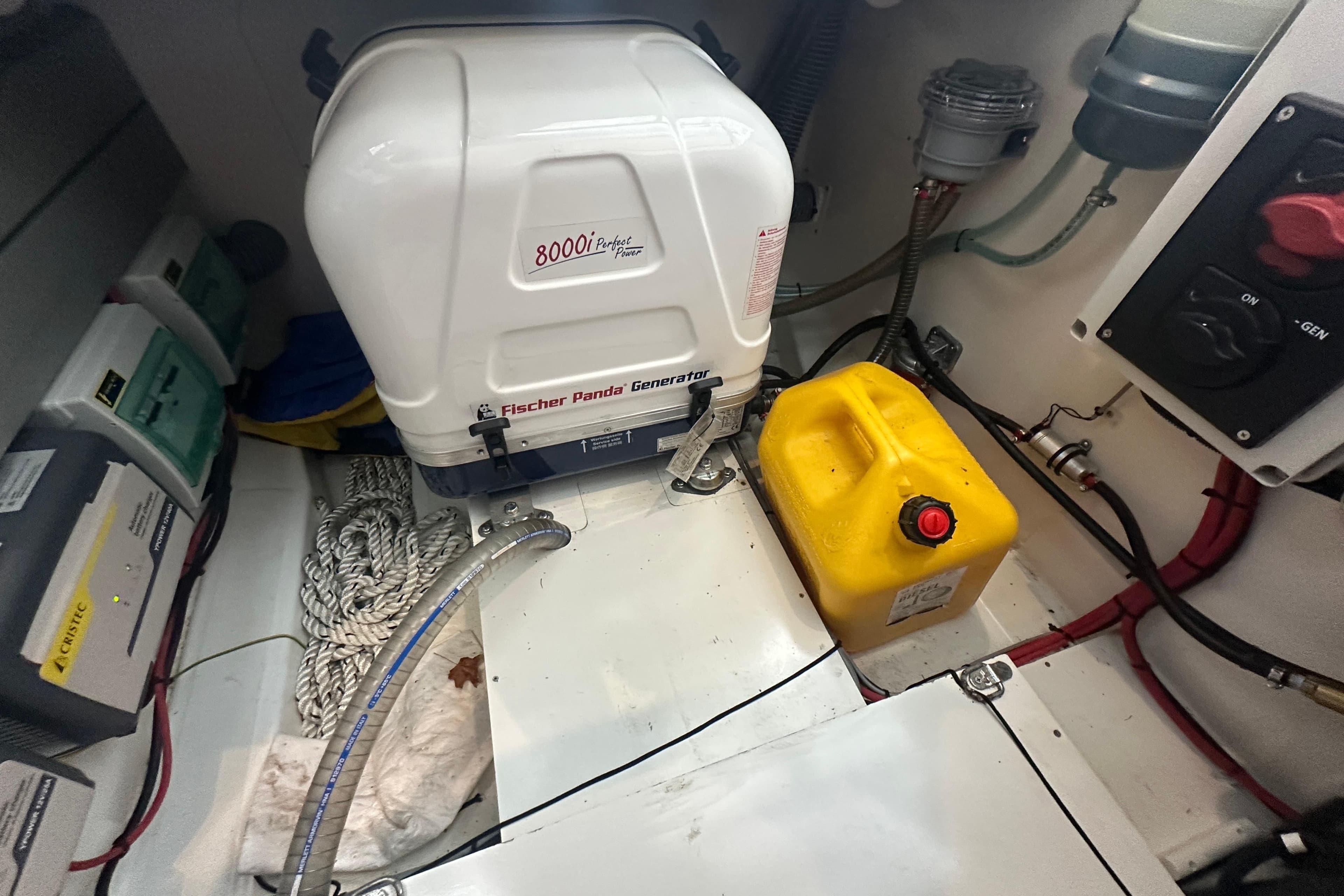 Engine room of 2023 Beneteau Antares 11 Coupe with Fischer Panda generator and fuel container.