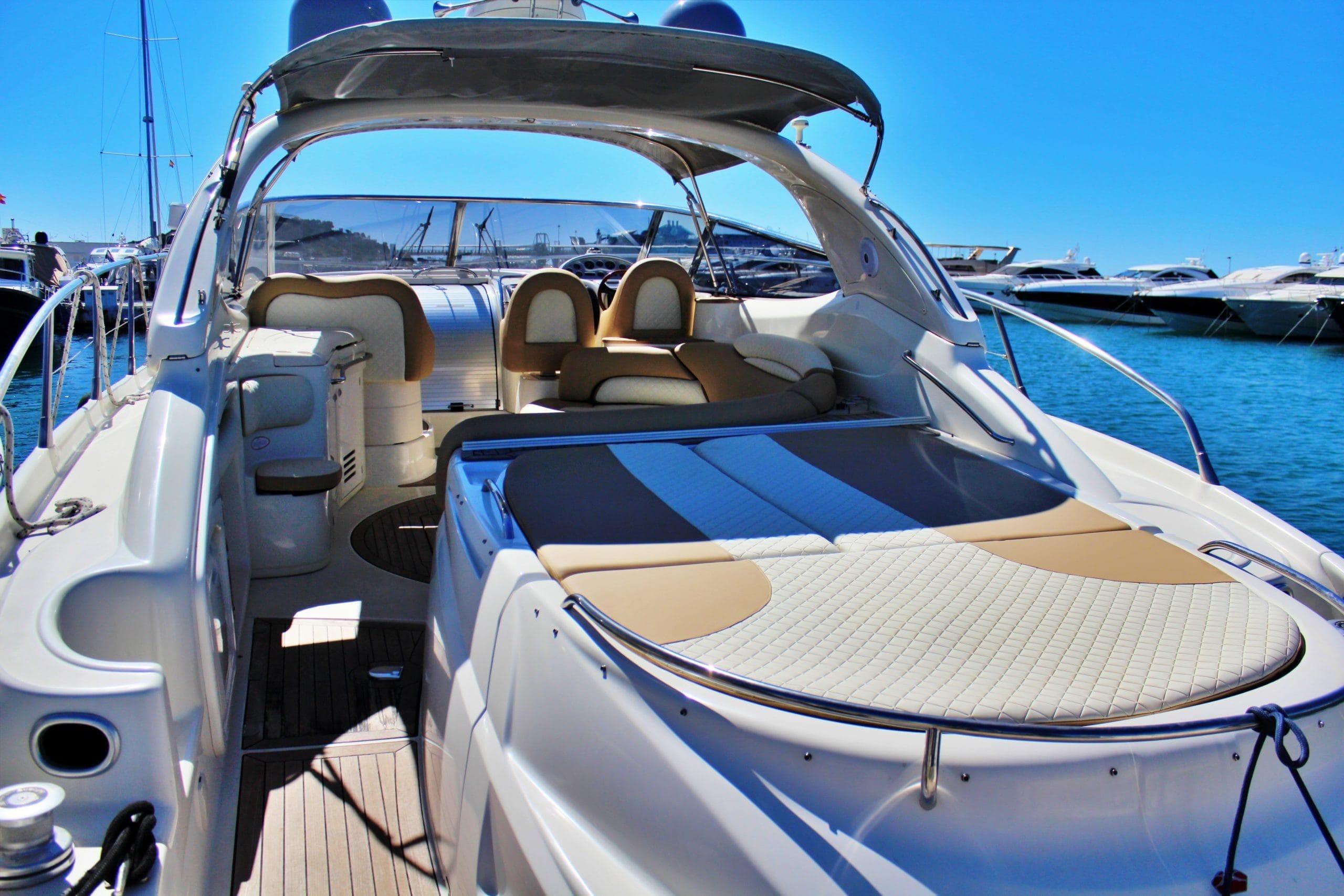 Luxurious 2001 Cranchi Mediterranée 50 yacht with spacious deck and elegant seating.