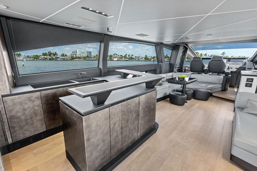 Luxurious interior of 2025 Pershing GTX 80 yacht with modern design and waterfront view.