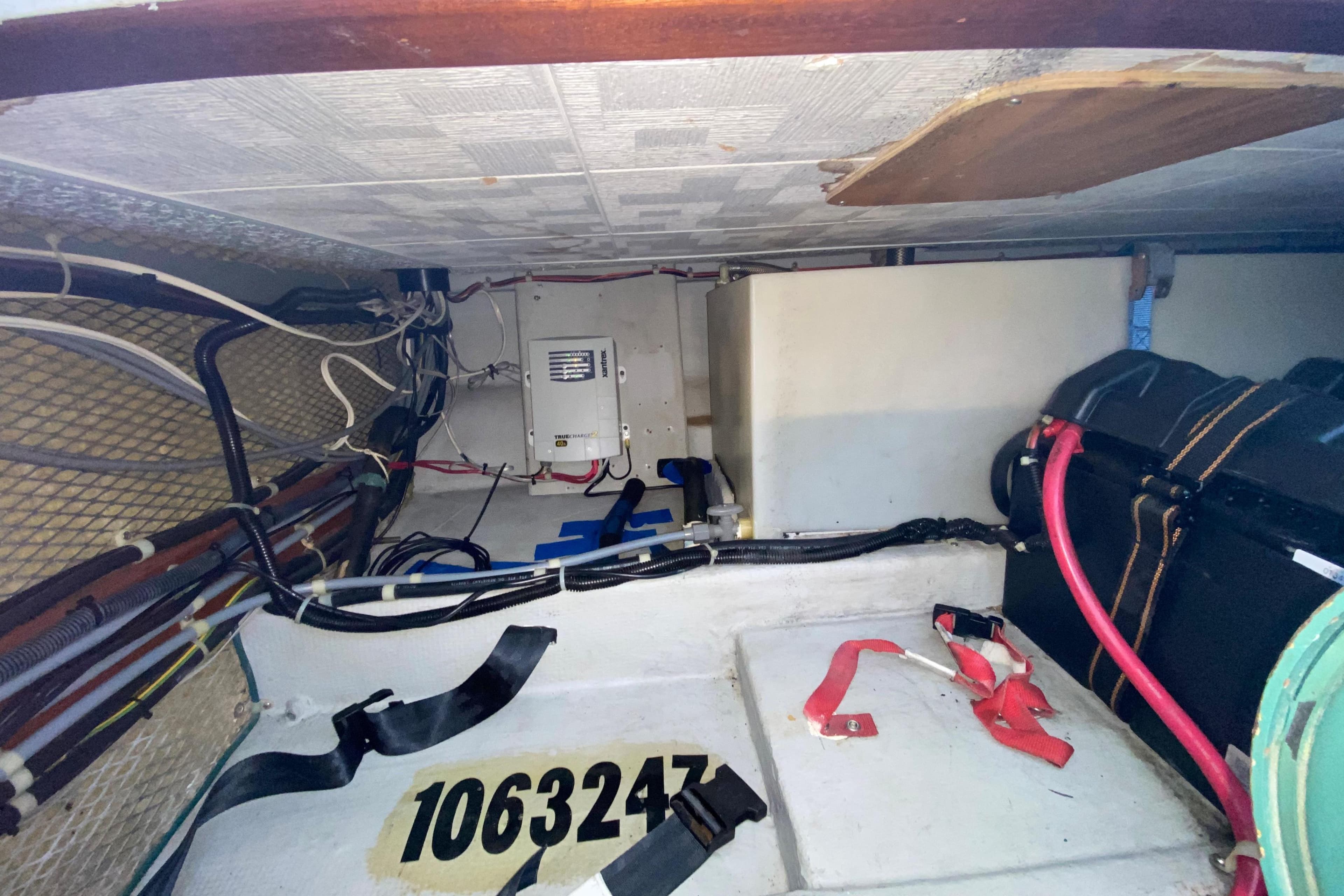 1998 Camano Troll 31 engine compartment with wiring and equipment.
