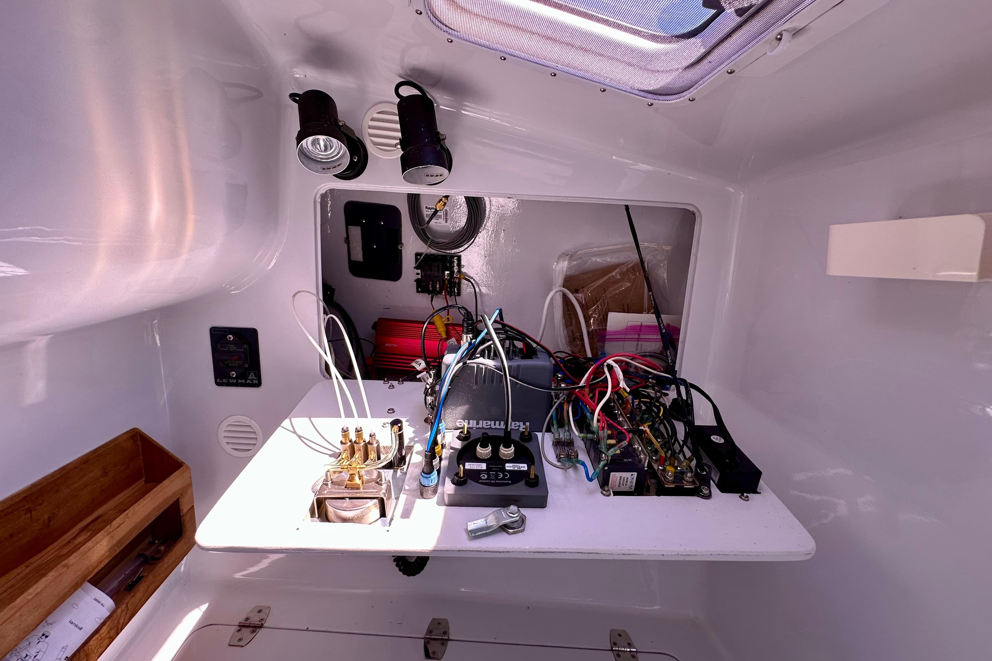 Interior of a 2012 Hughes 40 boat showing electrical wiring and components.