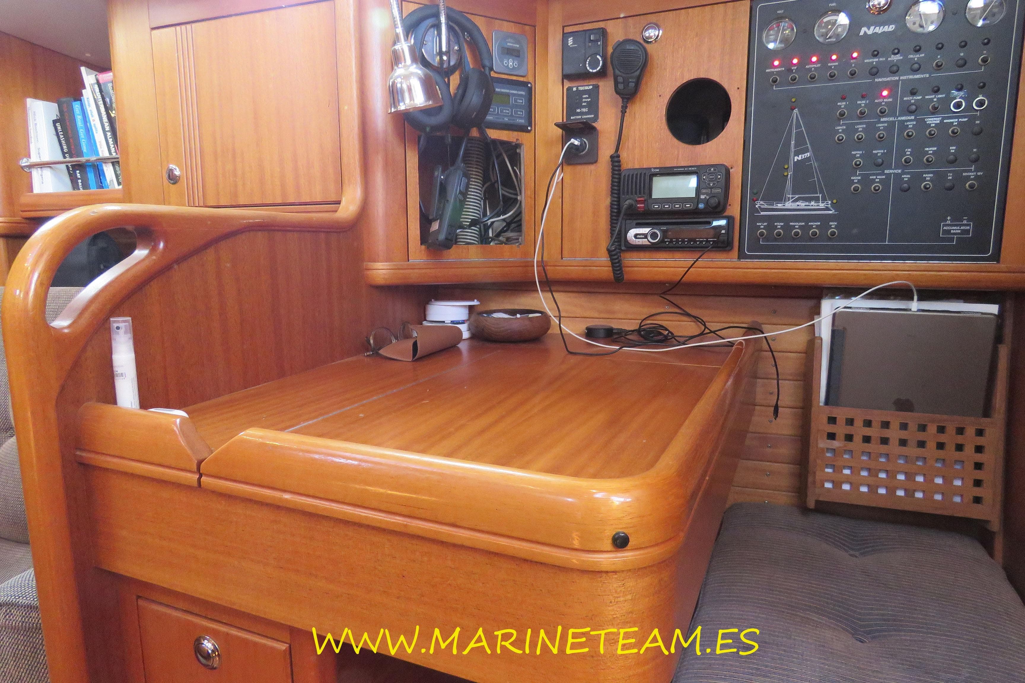 Navigation station of 2002 Najad 373 yacht with control panel and equipment.