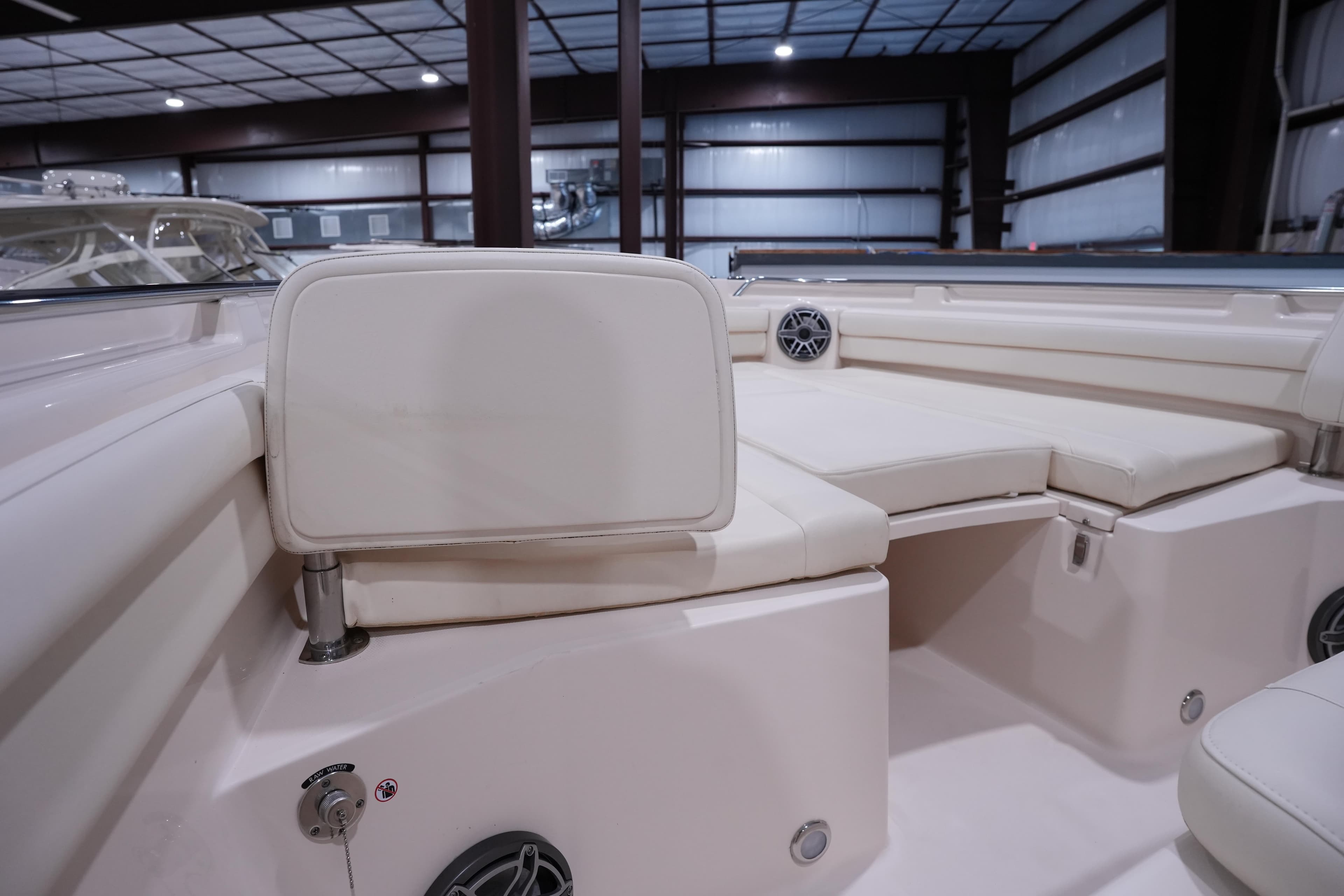 2023 Grady-White Canyon 336 boat interior with cushioned seating and speaker system.