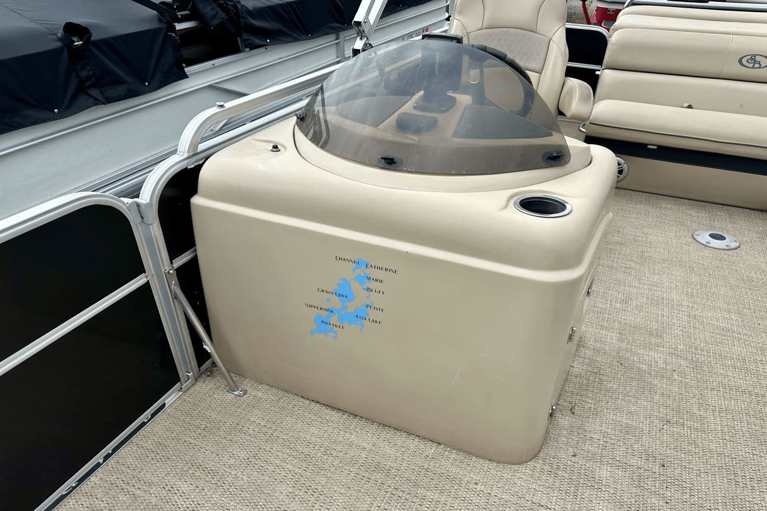 2015 South Bay 524 CR boat interior with beige console and seating.