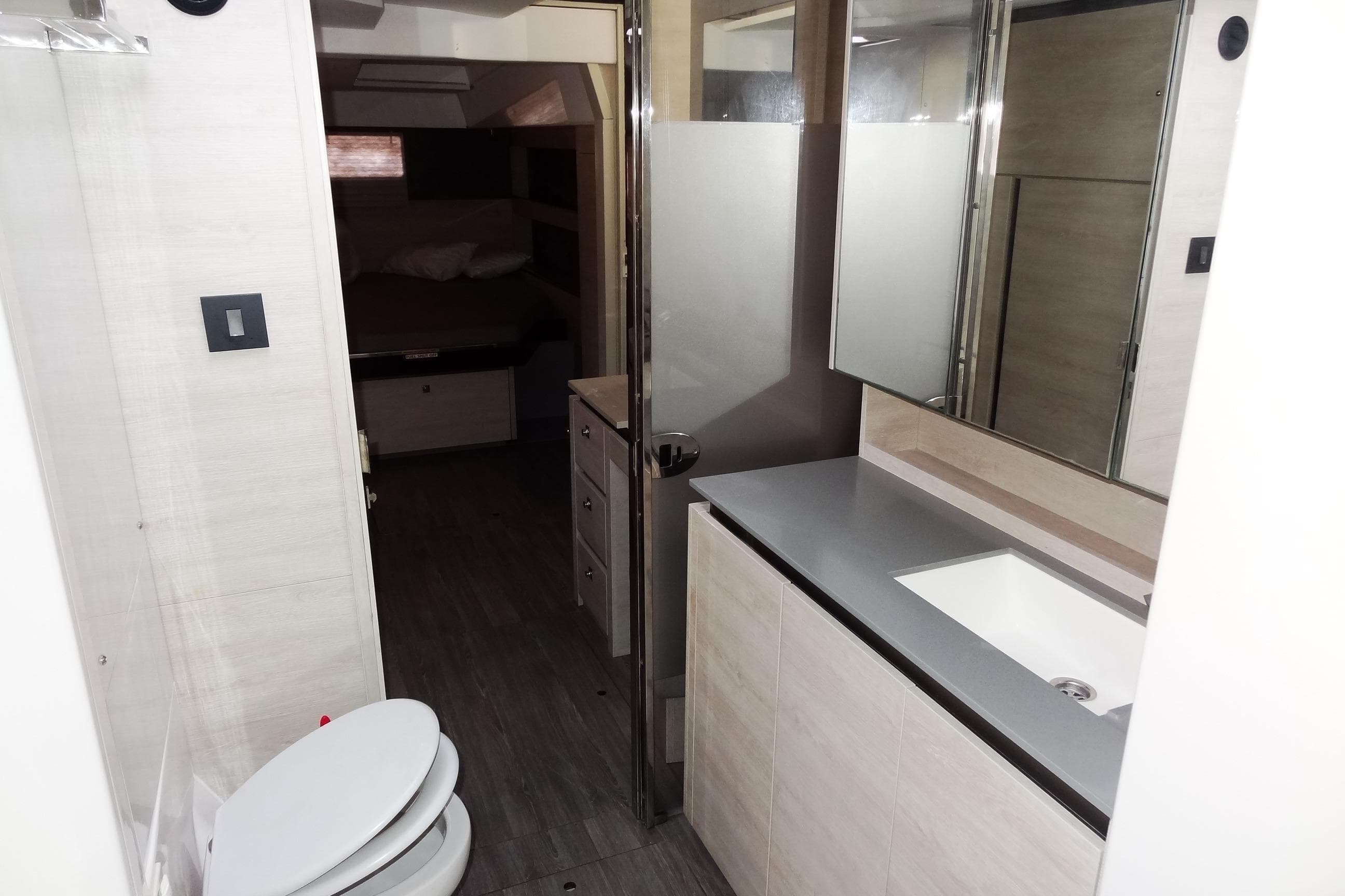 Modern bathroom interior in 2021 Leopard 50 yacht, featuring sleek design and spacious layout.